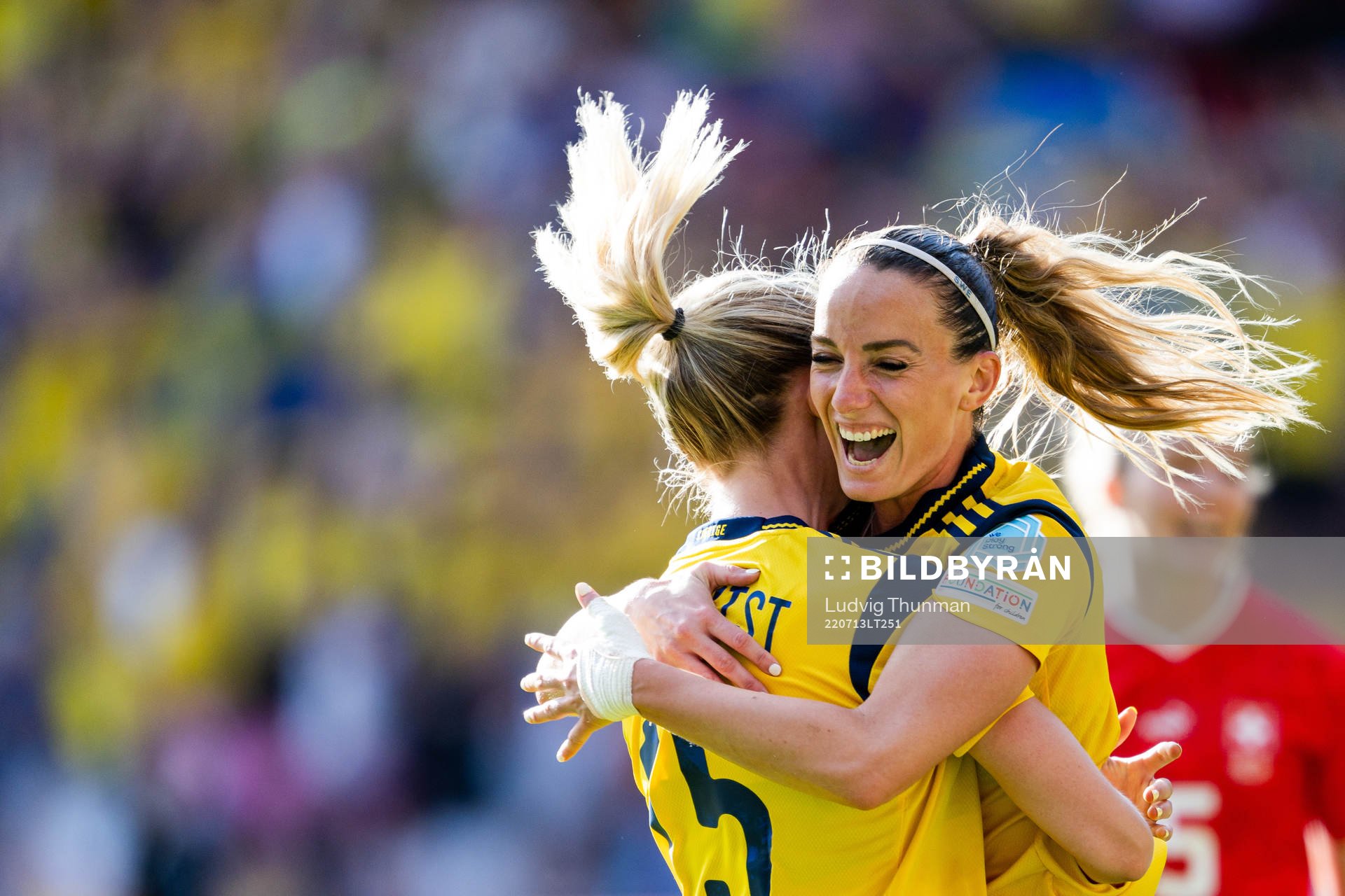 Rebecka Blomqvist and Kosovare Asllani of Sweden celebrate