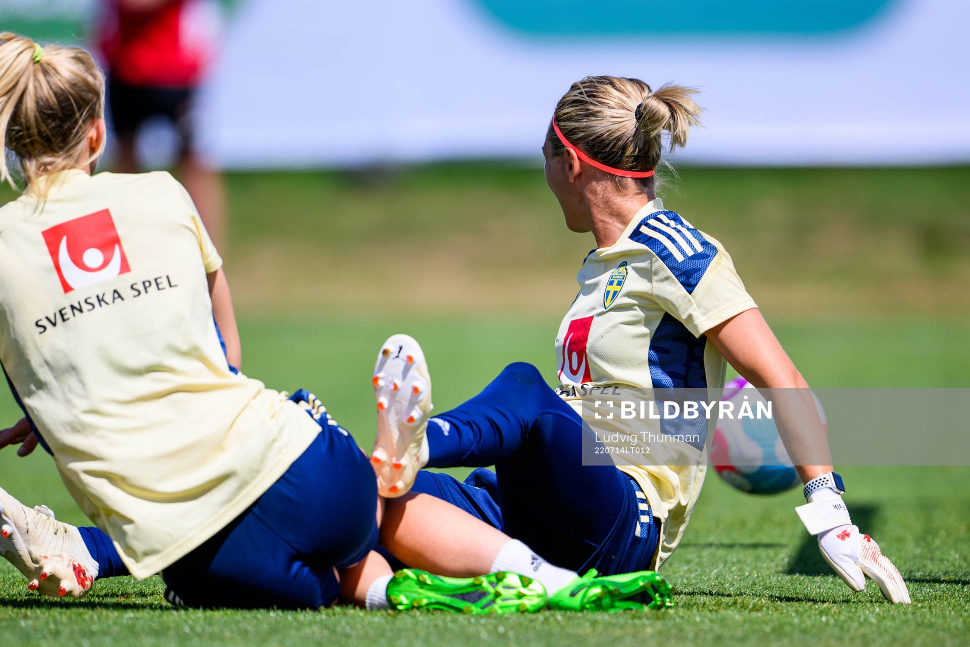 Sofia Jakobsson and goalkeeper Jennifer Falk of the Swedish
