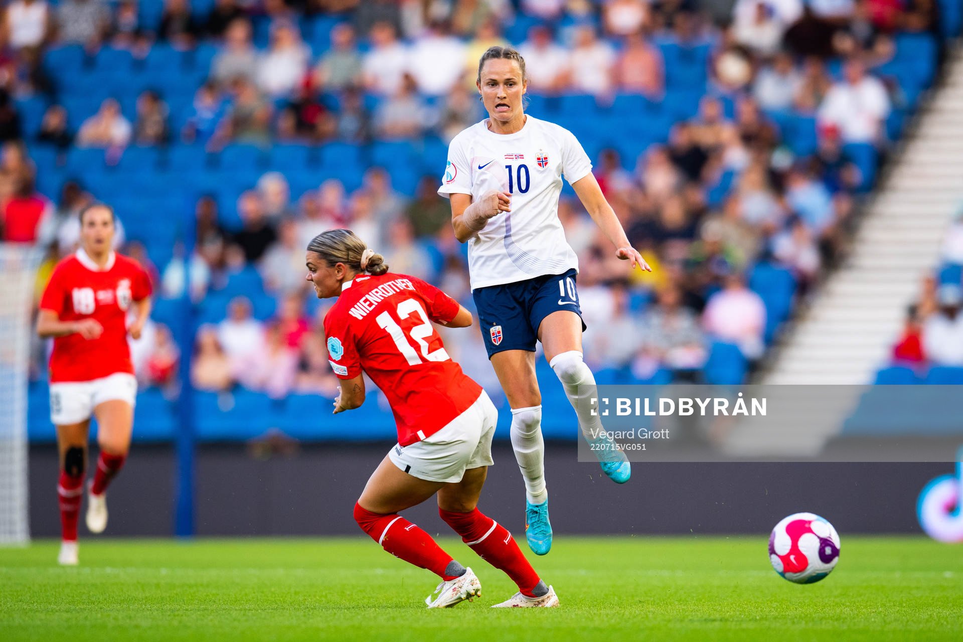 Laura Wienroither of Austria and Caroline Graham Hansen of Norway during the UEFA Women's Euro 2022 group stage match between Austria and Norway on July 15, 2022 in Brighton.