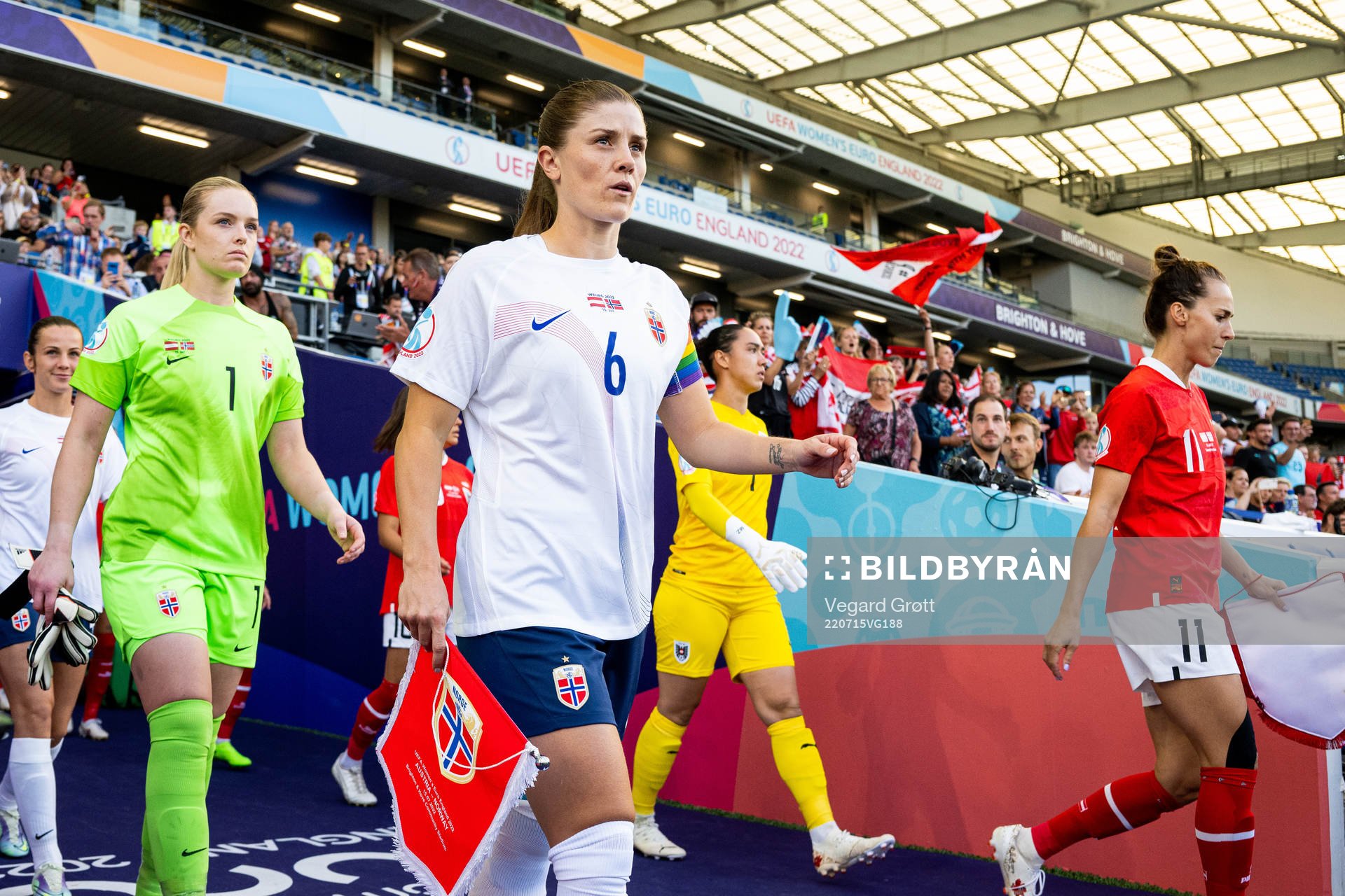 Goalkeeper Guro Pettersen and Maren Mjelde of Norway enter