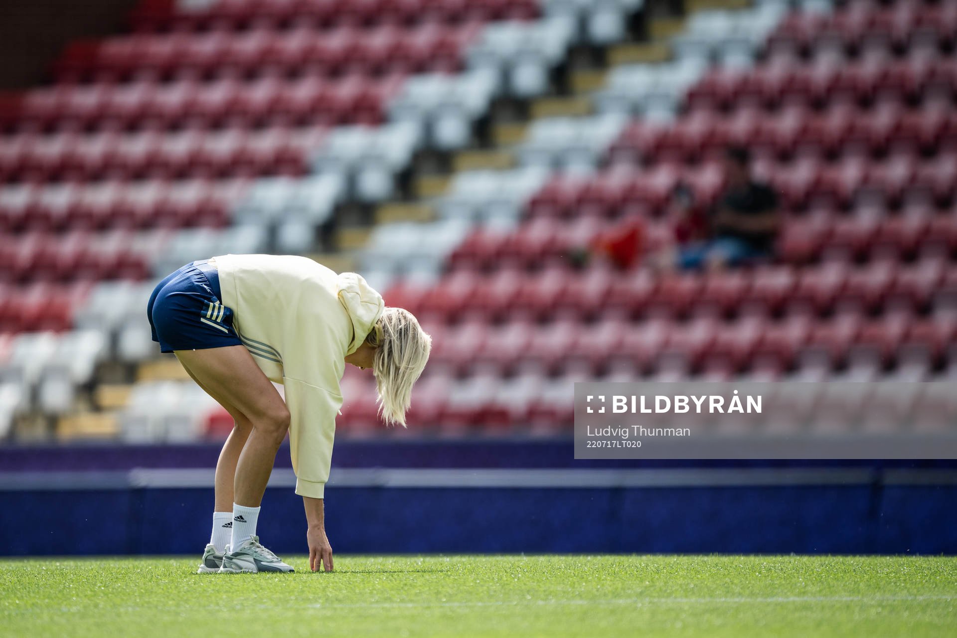Fridolina Rolfö of Sweden inspects the pitch