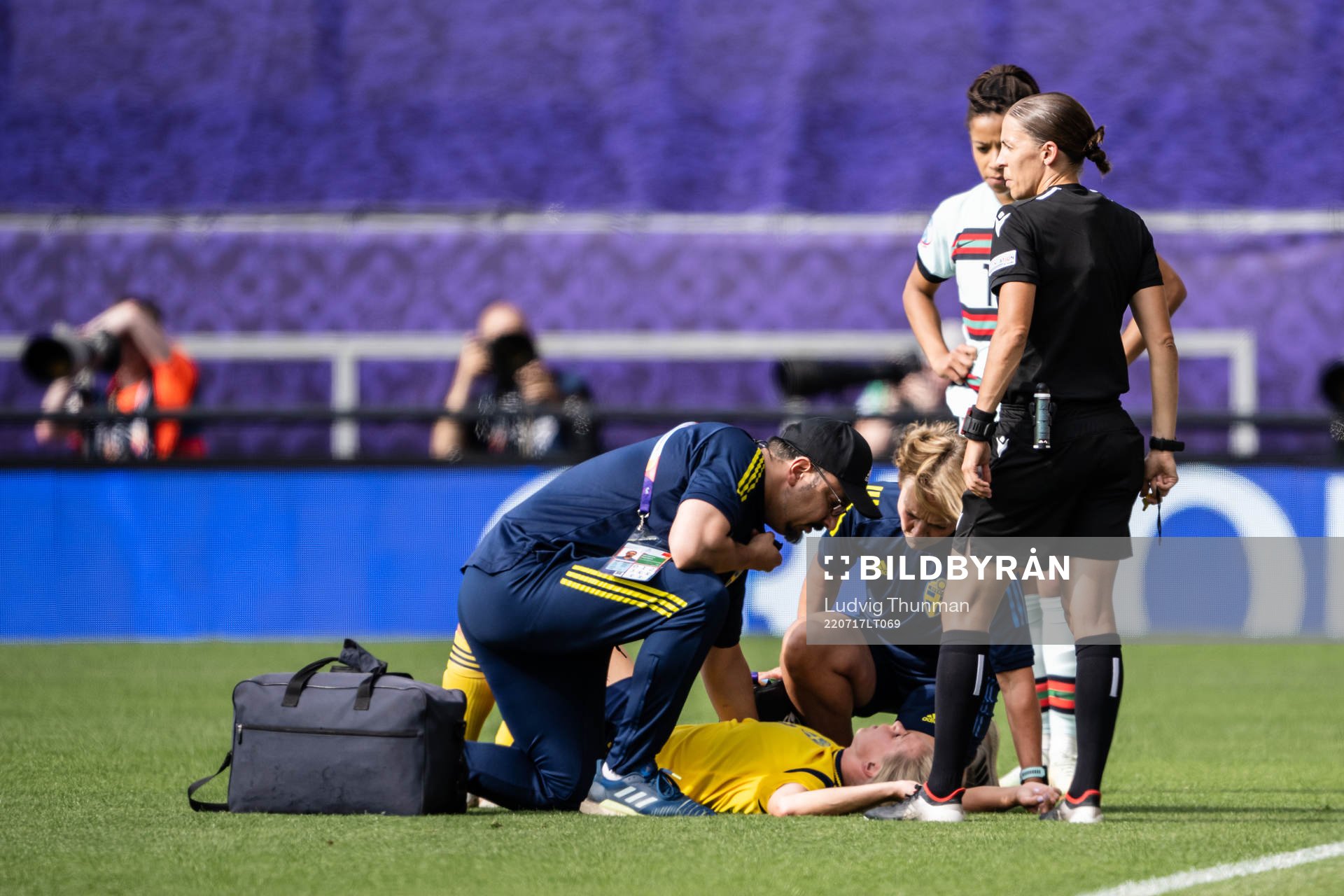 Jonna Andersson of Sweden receives medical attention
