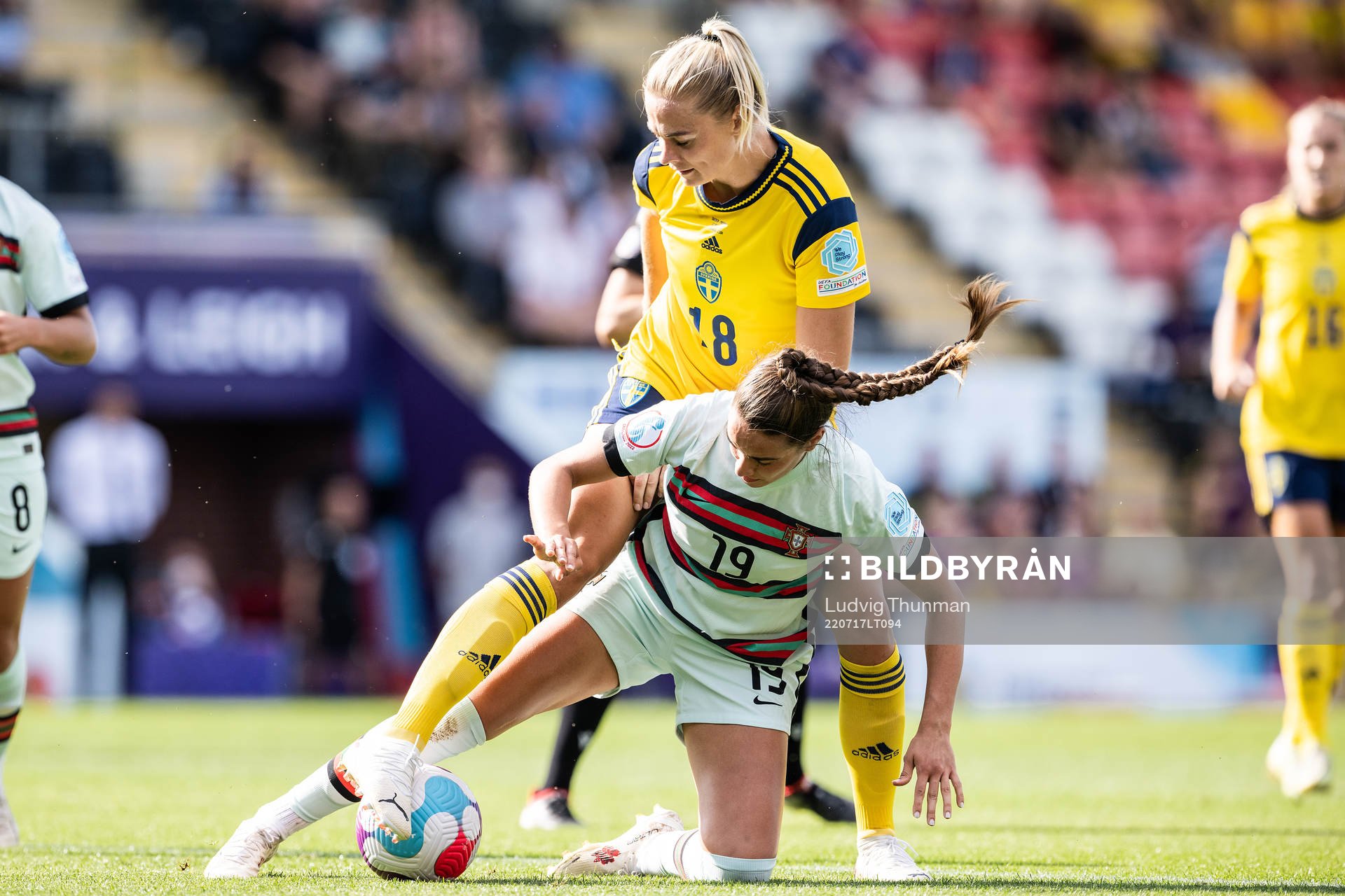 Fridolina Rolfö of Sweden and Diana Gomes of Portugal during the UEFA Women's Euro 2022 group stage match between Sweden and Portugal on July 17, 2022 in Leigh.