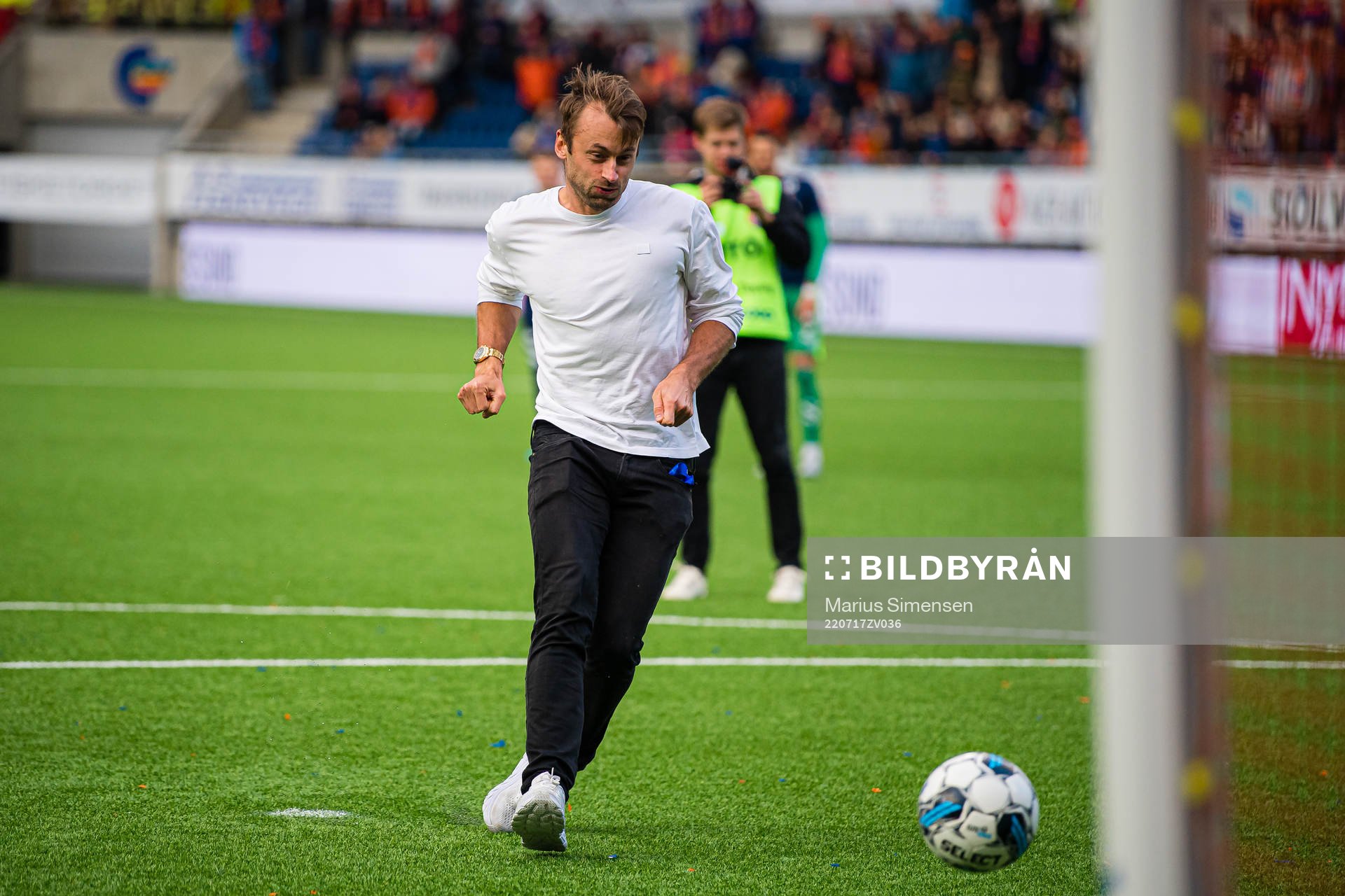 Petter Northug scores on a penalty kick during a half-time break show during the Eliteserien match between Aalesund and Rosenborg on July 17, 2022 in Ålesund.