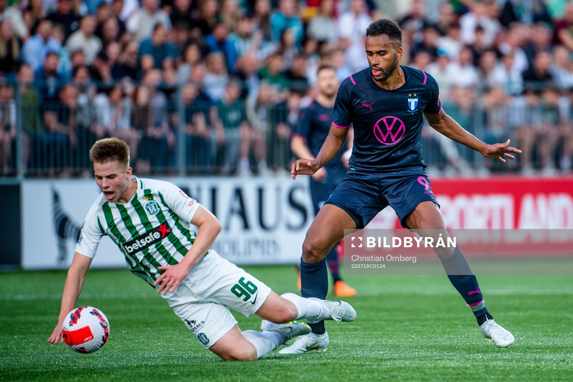 Gustas Jarusevičius of FK Zalgiris and Isaac Kiese Thelin of Malmö FF during the UEFA Champions League qualifying match between FK Zalgiris and Malmö FF on July 19, 2022 in Vilnius.