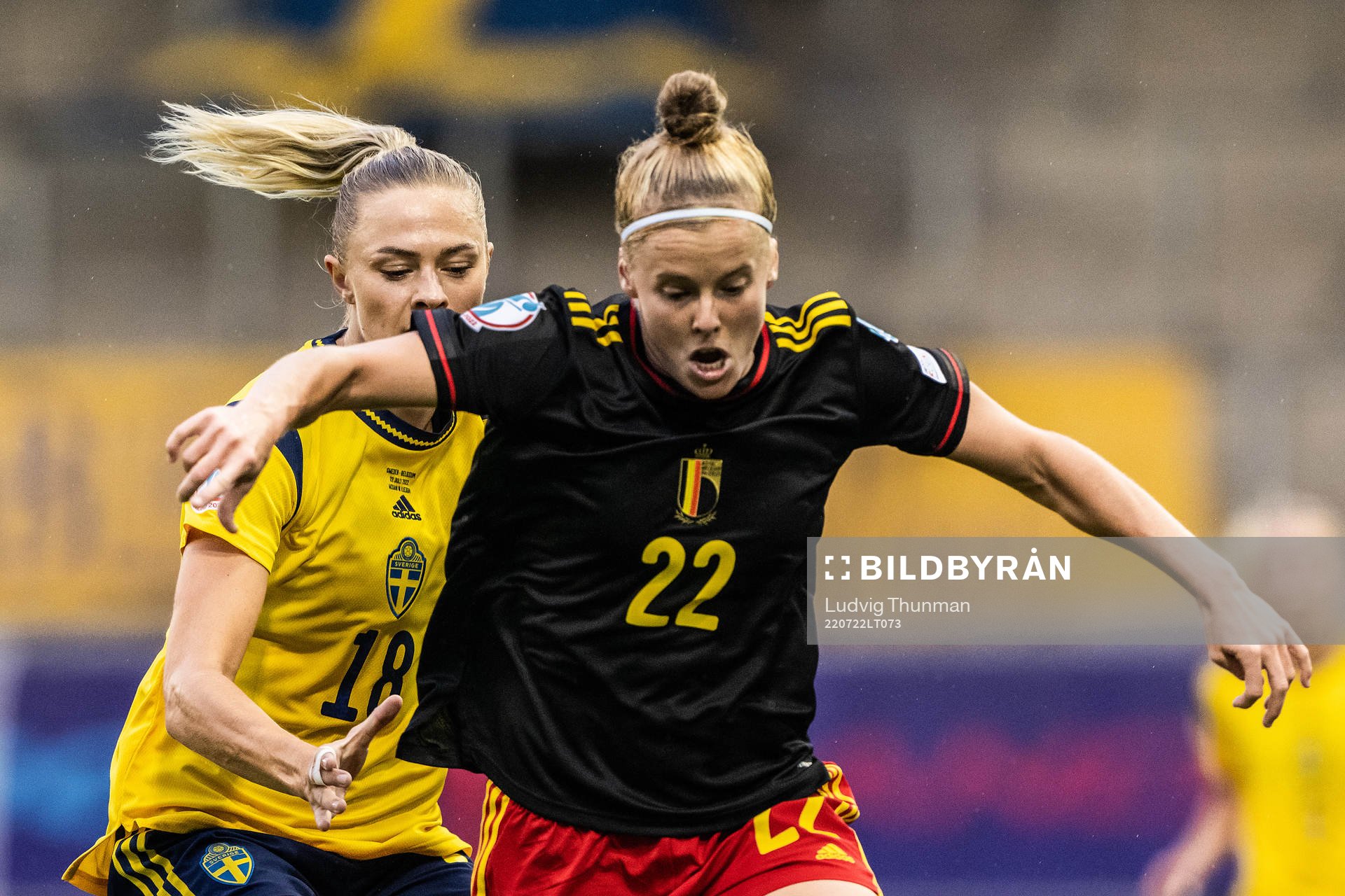 Fridolina Rolfö of Sweden and Laura Deloose of Belgium during the UEFA Women's Euro 2022 quarter final match between between Sweden and Belgium on July 22, 2022 in Leigh.