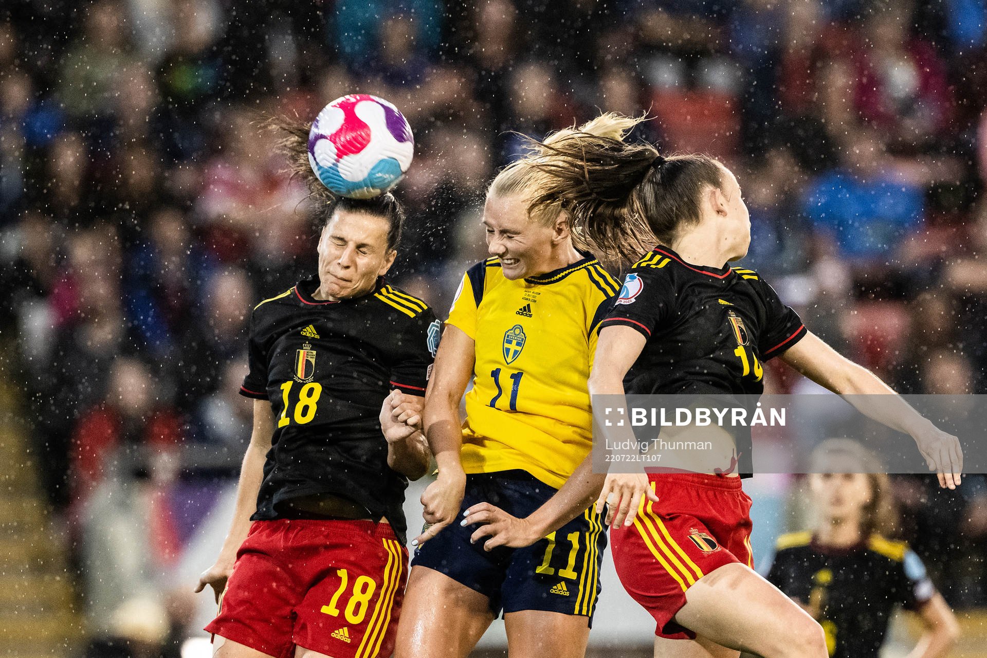Laura De Neve of Belgium and Stina Blackstenius of Sweden during the UEFA Women's Euro 2022 quarter final match between between Sweden and Belgium on July 22, 2022 in Leigh.