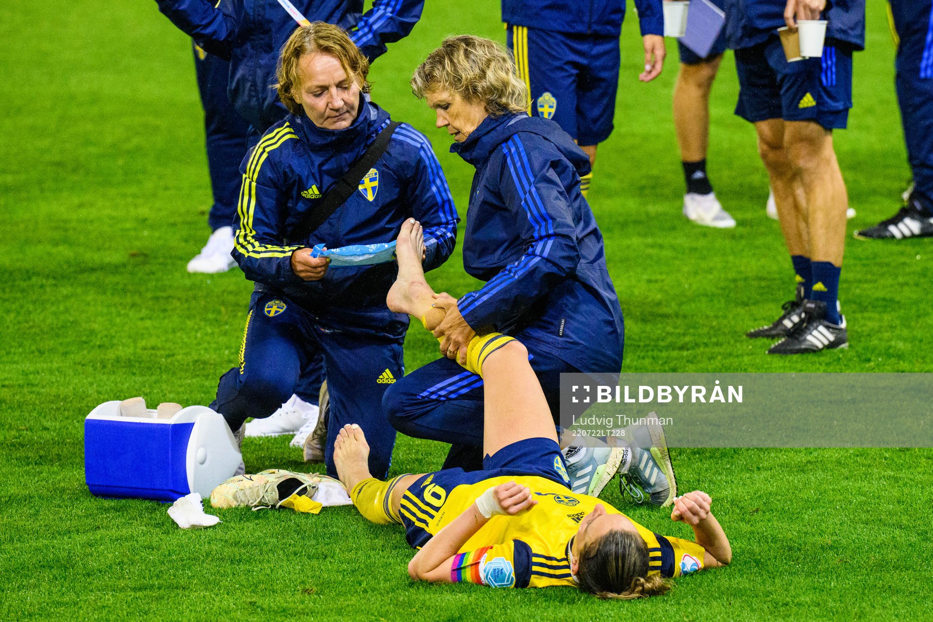 Annica Näsmark, physio treats Kosovare Asllani of Sweden