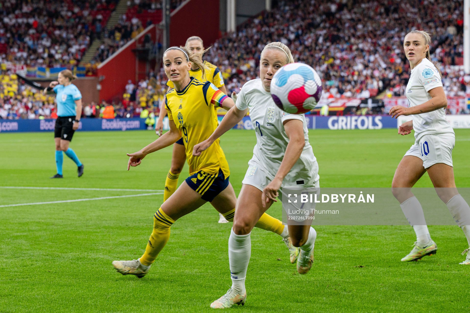 Kosovare Asllani of Sweden and Beth Mead of England