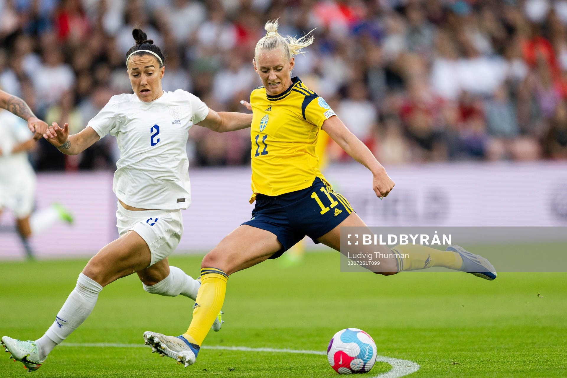 Lucy Bronze of England and Stina Blackstenius of Sweden