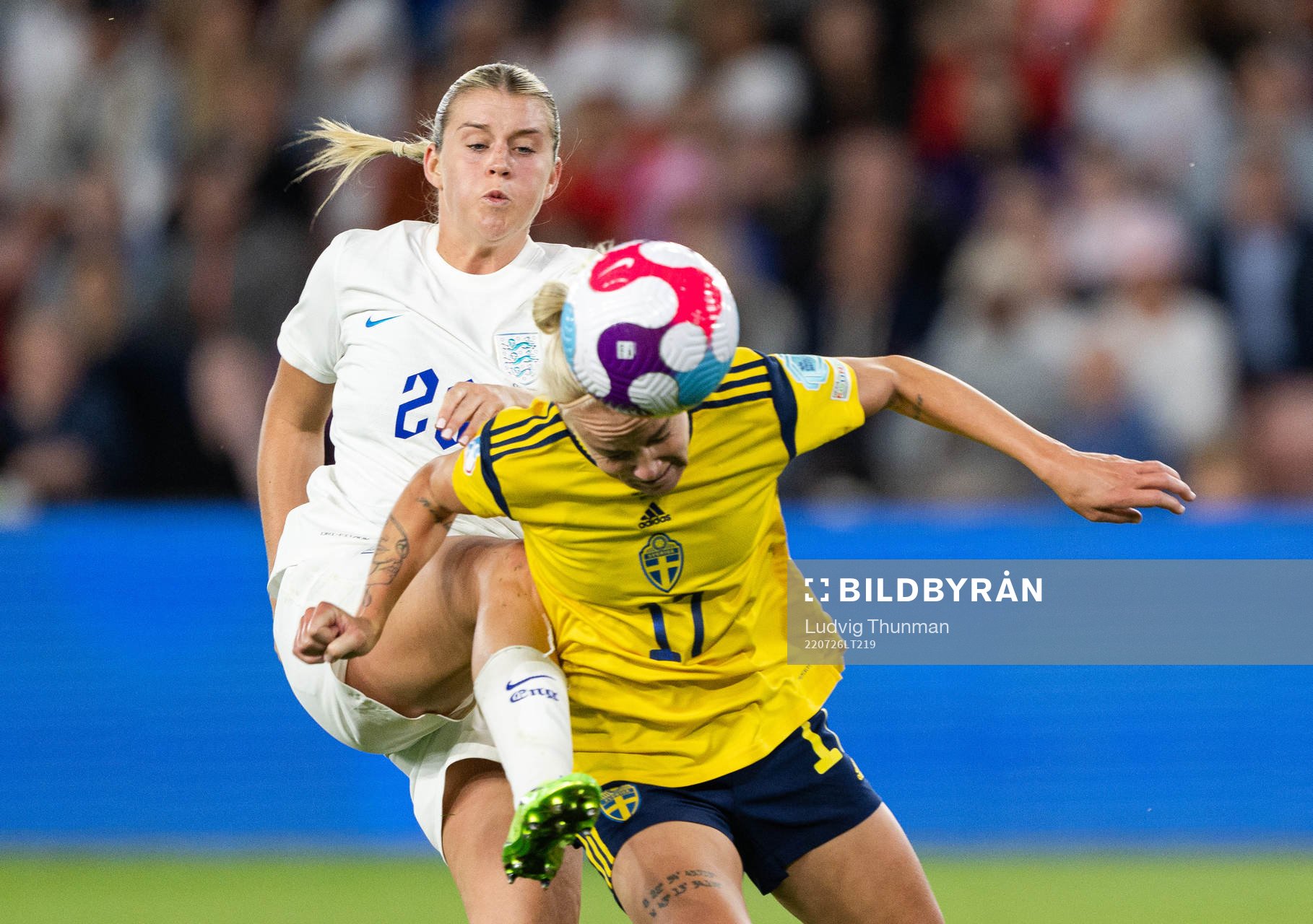 Alessia Russo of England and Caroline Seger of Sweden