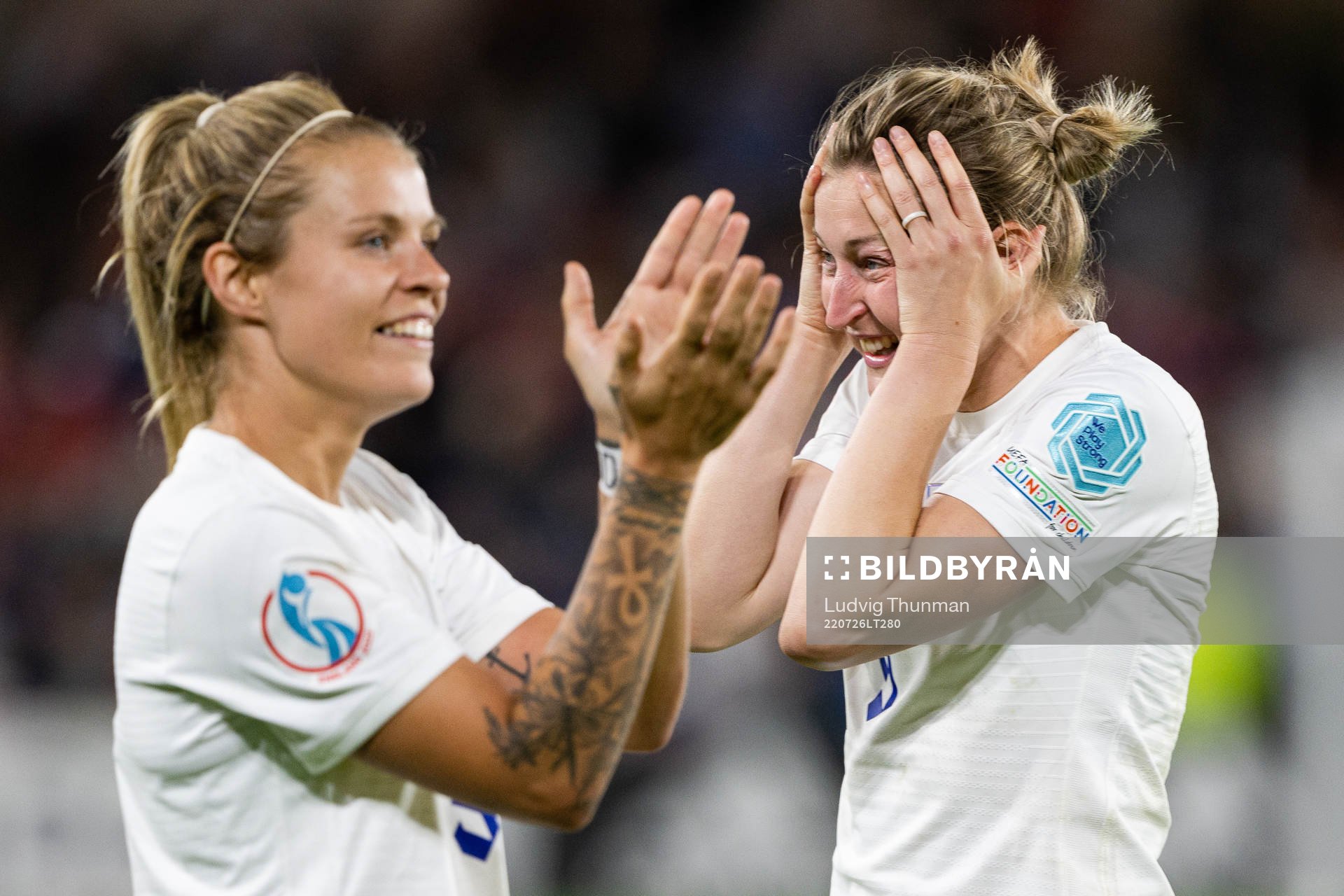 Rachel Daly and Ellen White of England celebrate