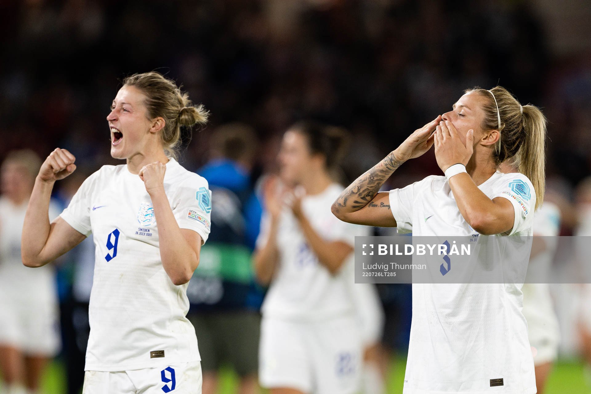 Rachel Daly and Ellen White of England celebrate