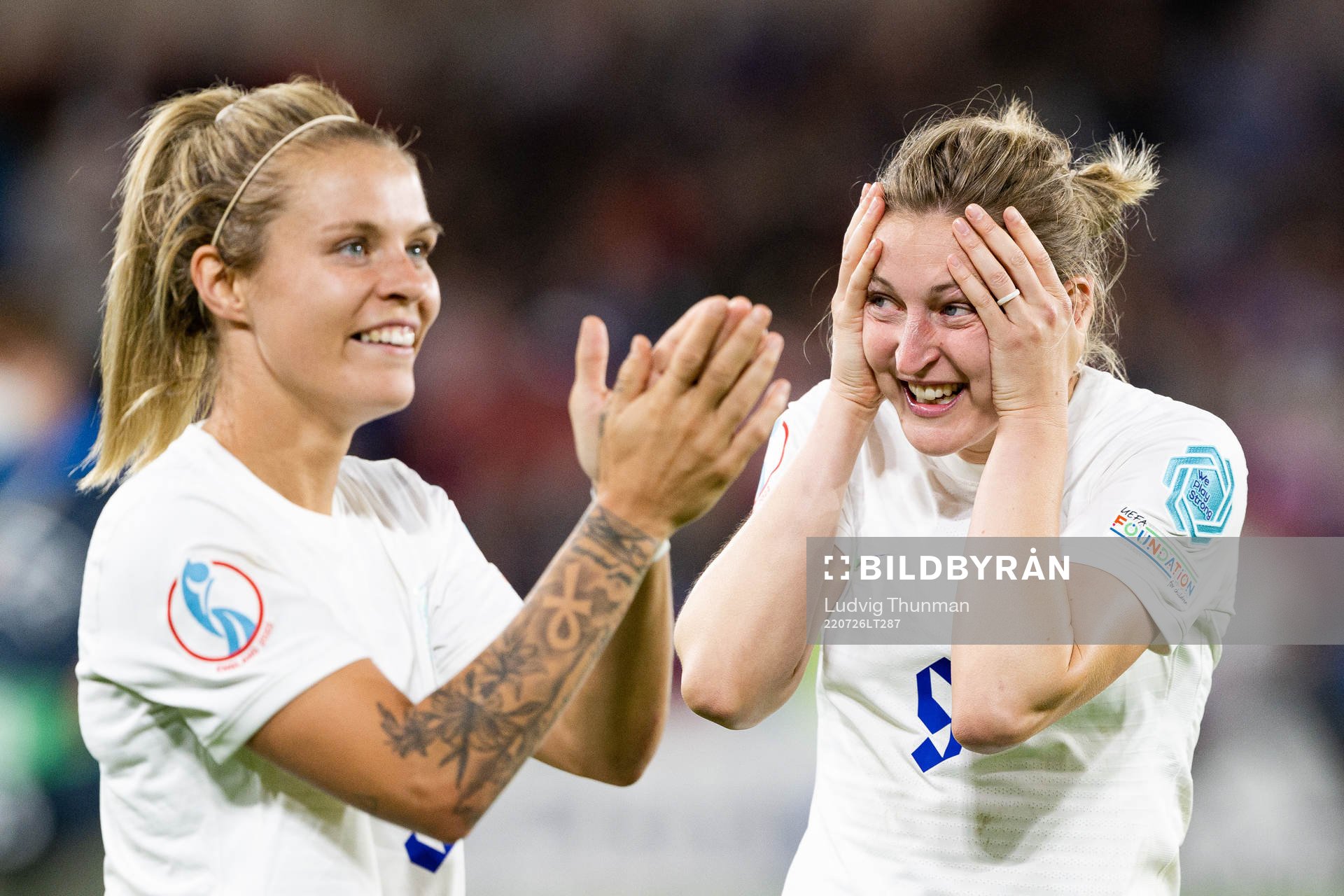Rachel Daly and Ellen White of England celebrate