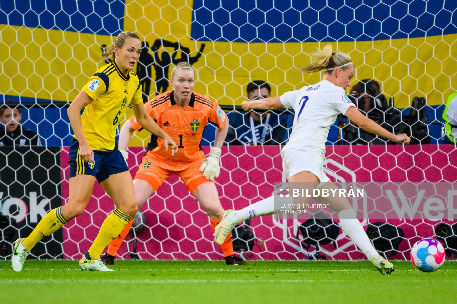 Beth Mead of England scores 1-0 behind goalkeeper Hedvig