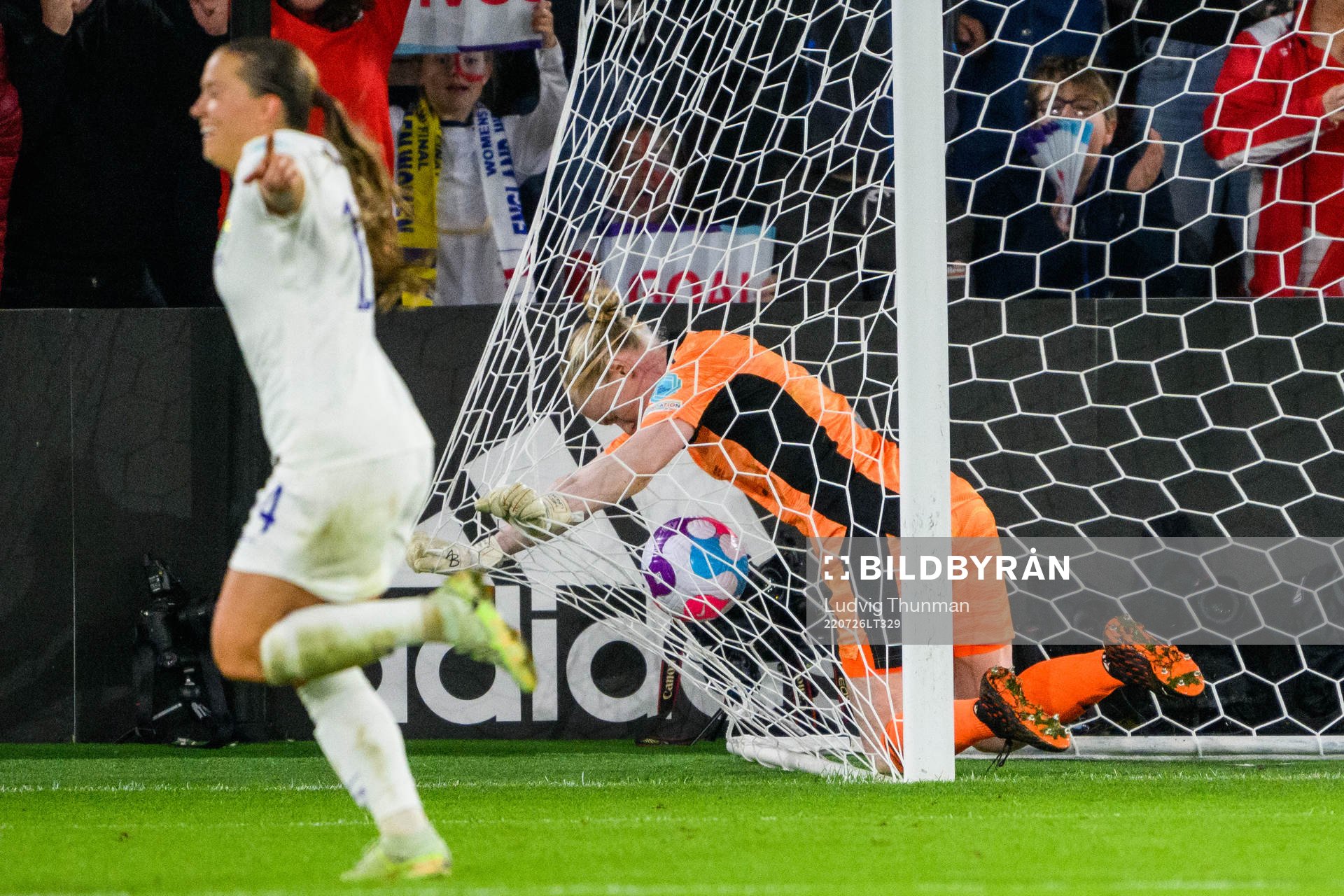Fran Kirby of England celebrates while goalkeeper Hedvig