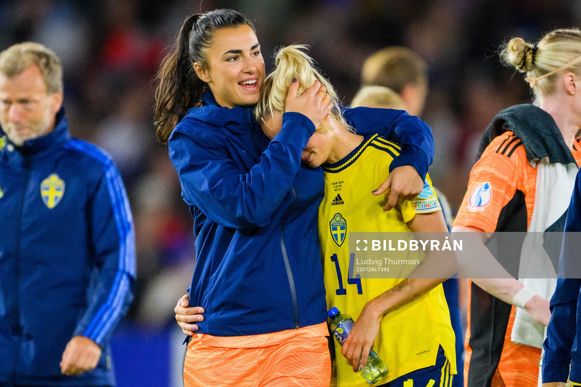 Nathalie Björn is comforted by goalkeeper Zecira Musovic