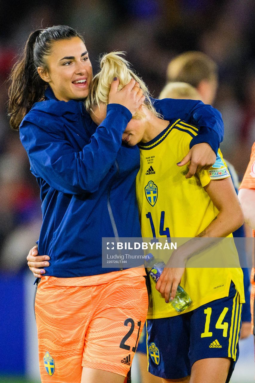 Nathalie Björn is comforted by goalkeeper Zecira Musovic
