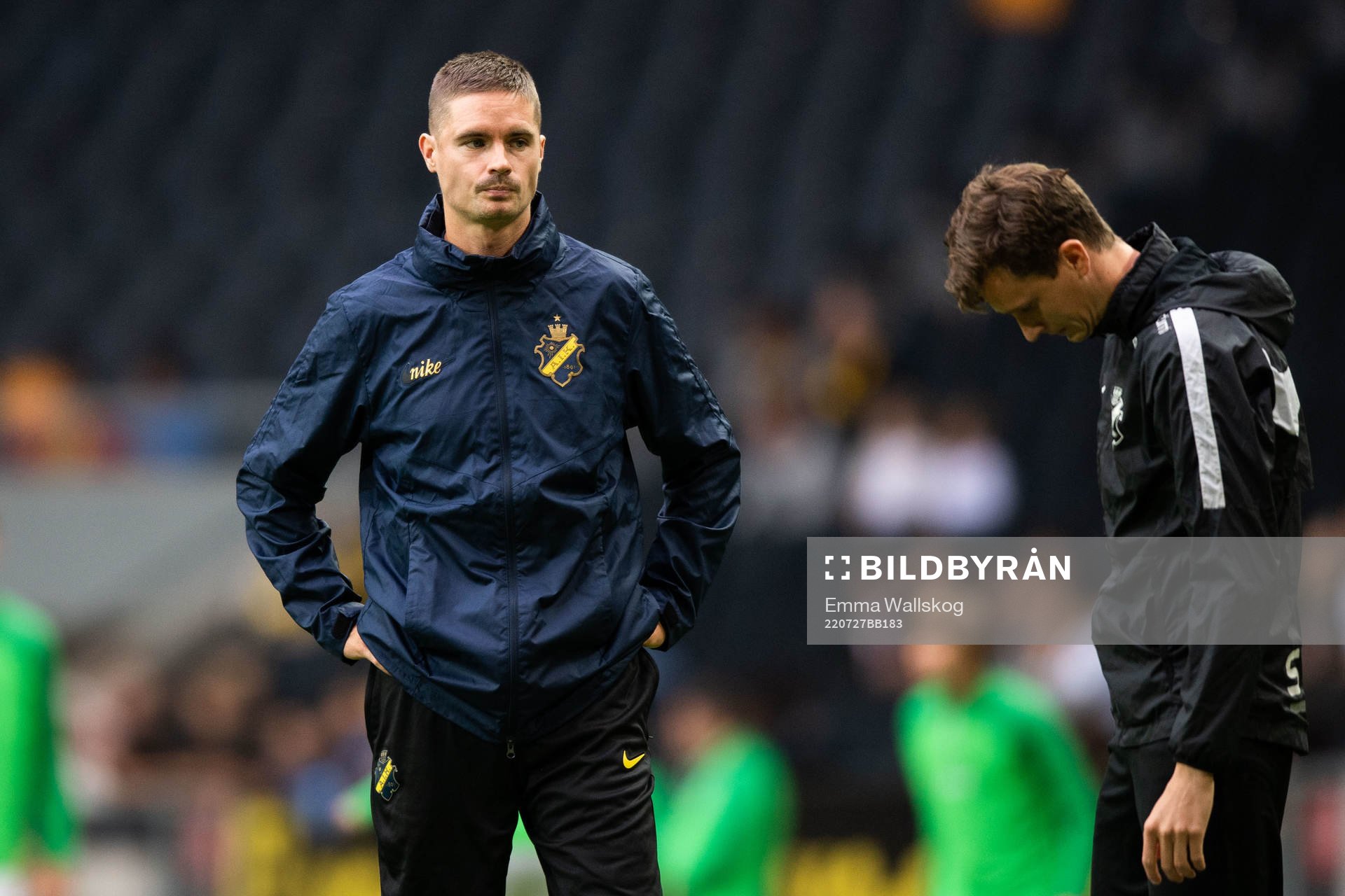 Mikael Lustig of AIK and Martin Falk, assistant coach