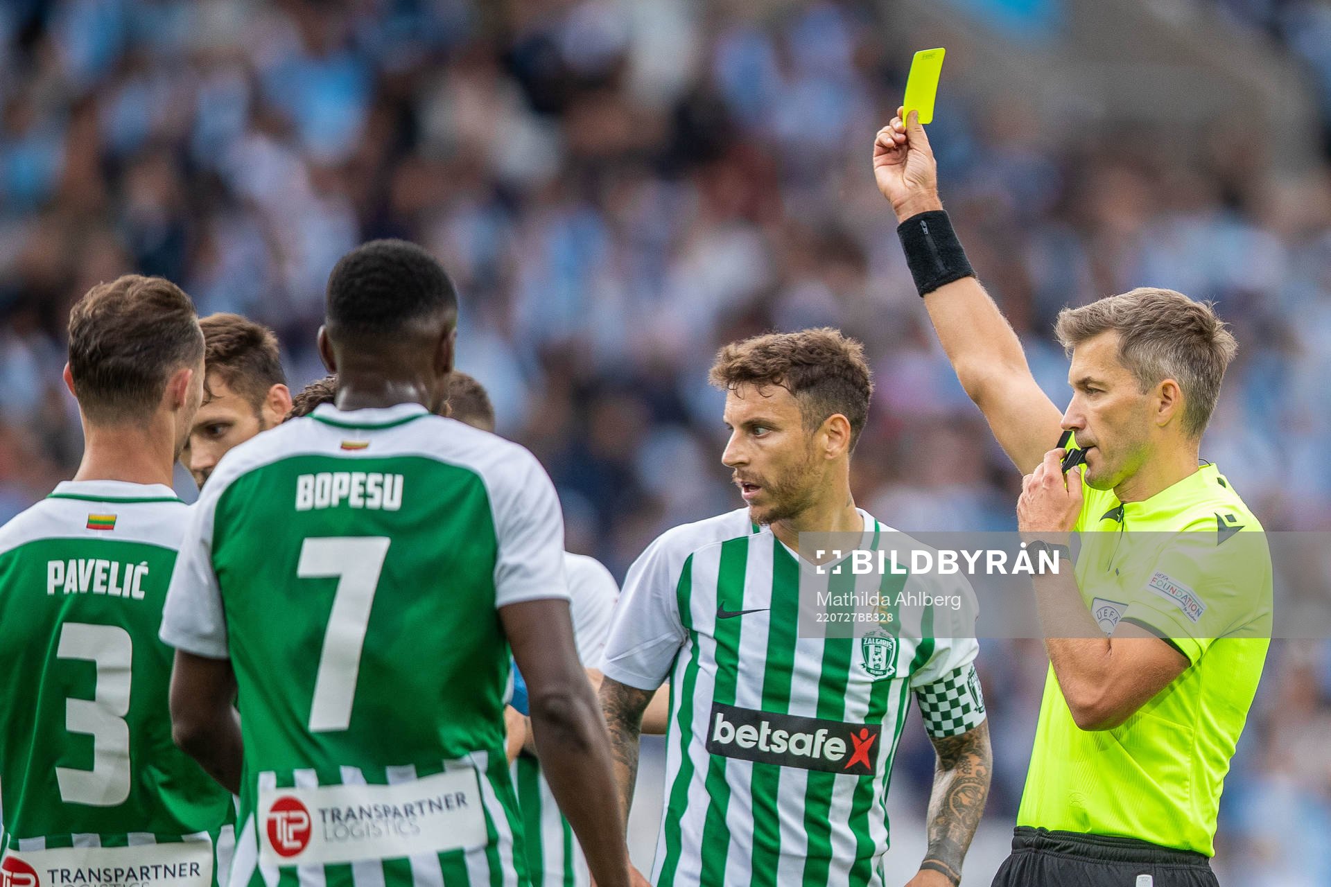 Referee Kristo Tohver with a yellow card during the UEFA Champions League qualifying match between Malmö FF and Zalgiris Vilnius on July 27, 2022 in Malmö.