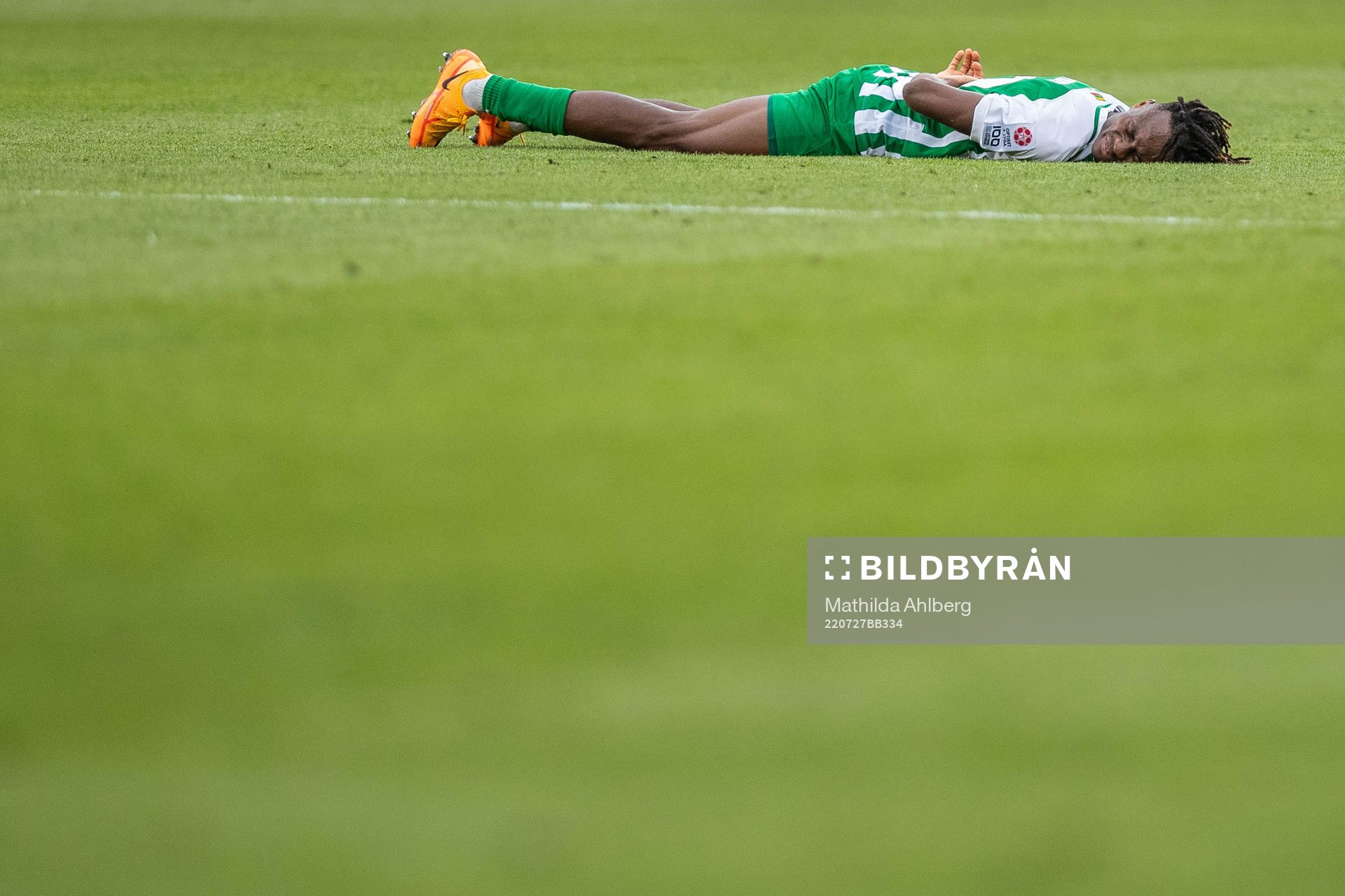 Kehinde Mathias Oyewusi of Zalgiris Vilnius in pain during the UEFA Champions League qualifying match between Malmö FF and Zalgiris Vilnius on July 27, 2022 in Malmö.