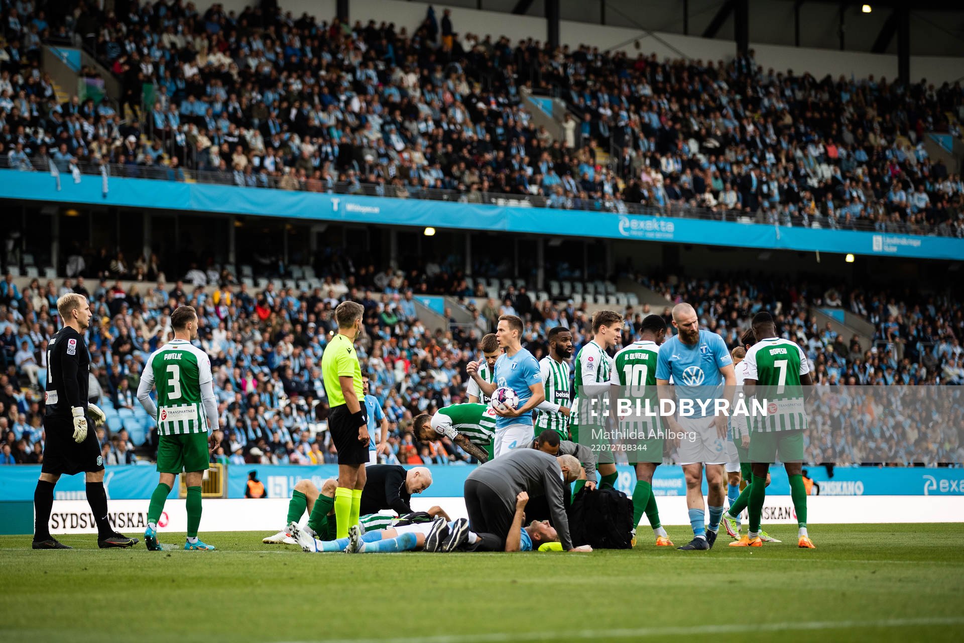 Ola Toivonen of Malmö FF receives medical attention