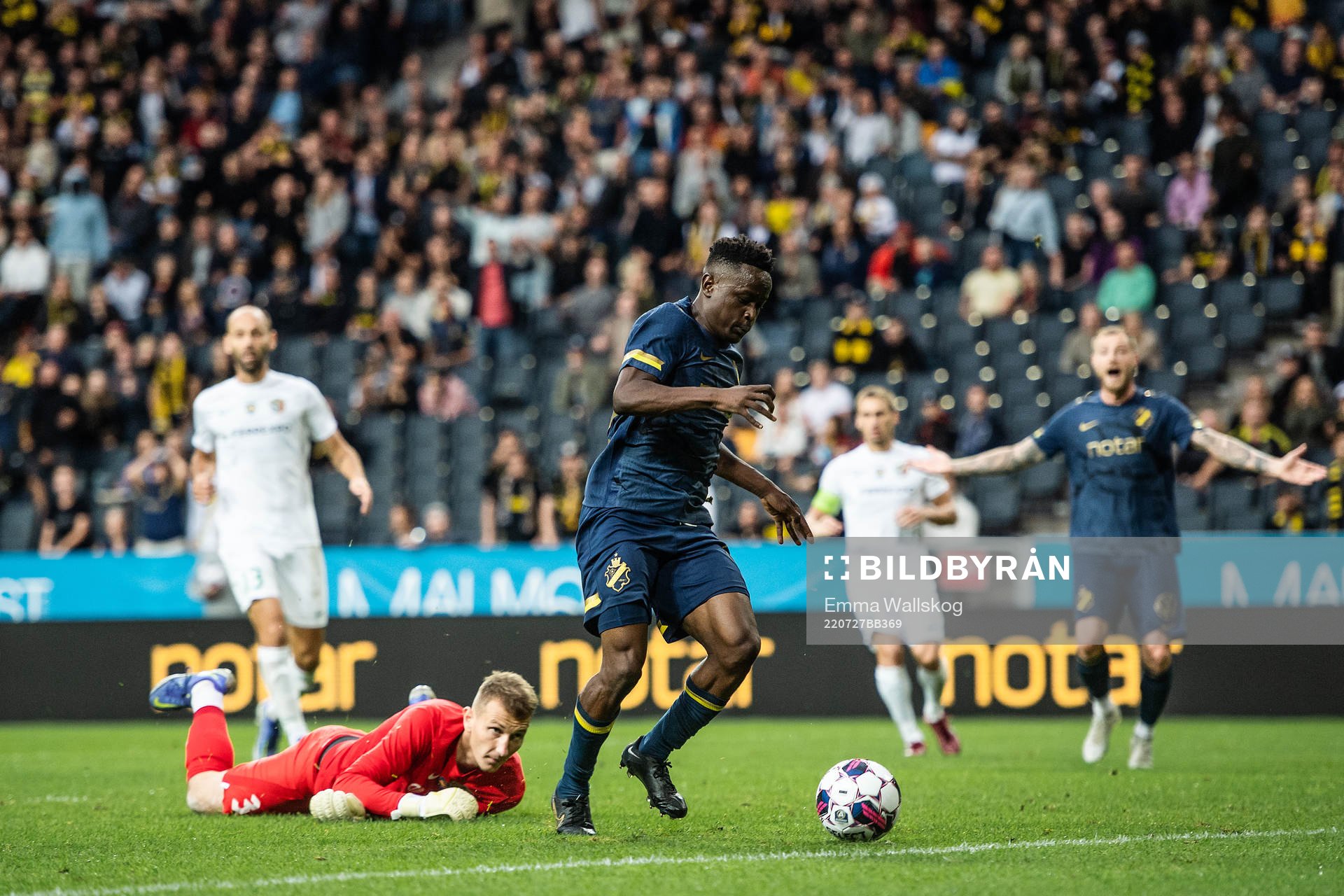 Josafat Mendes of AIK and goalkeeper Dmytro Riznyk of