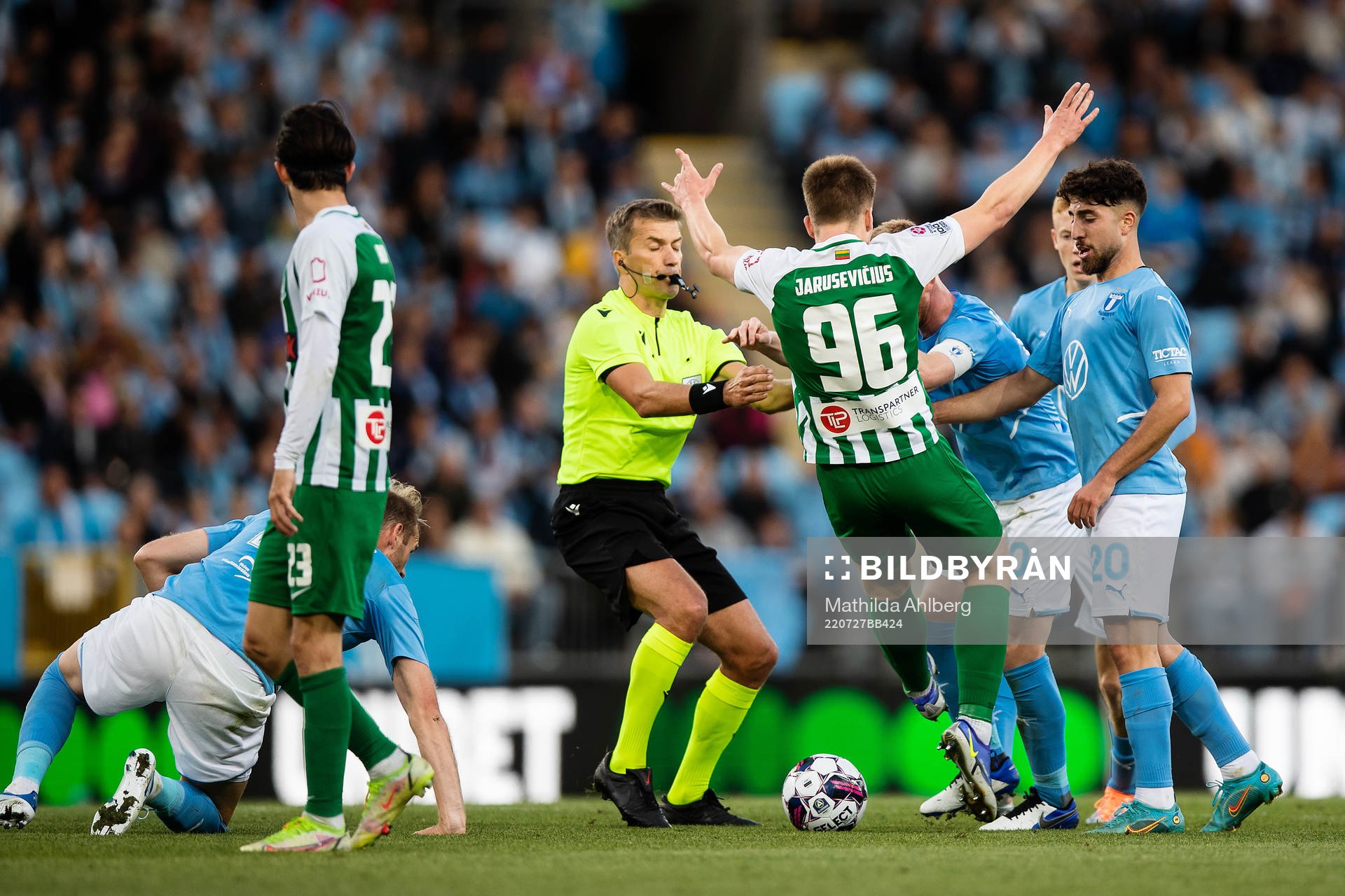 Anders Christiansen of Malmö FF in a situation with Gustas Jarusevicius of Zalgiris Vilnius which leads to his second yellow card during the UEFA Champions League qualifying match between Malmö FF and Zalgiris Vilnius on July 27, 2022 in Malmö.