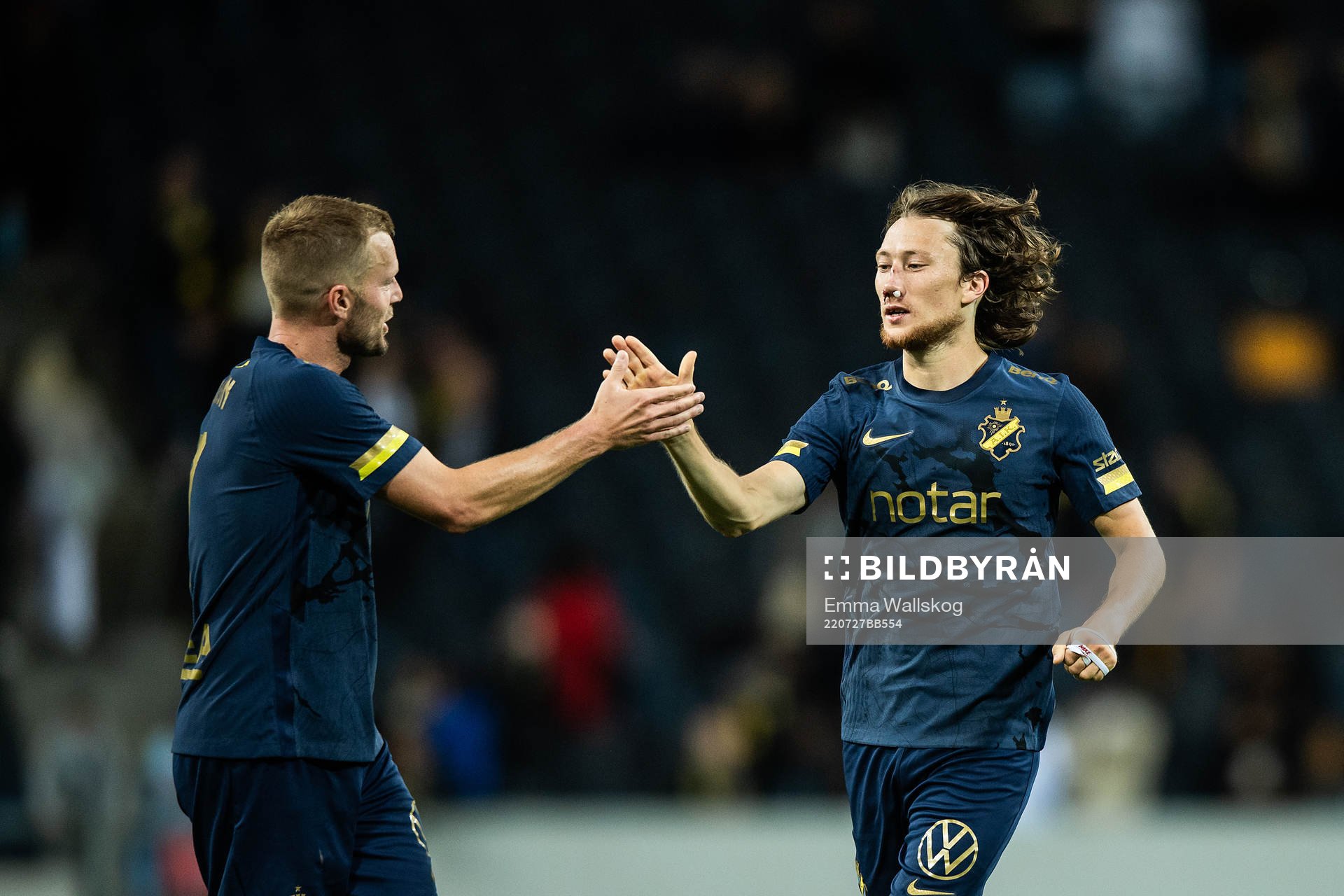 Sebastian Larsson and Axel Björnström of AIK celebrate