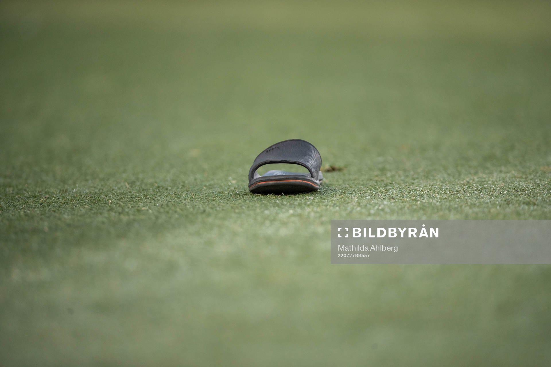 A shoe gets thrown in to the pitch