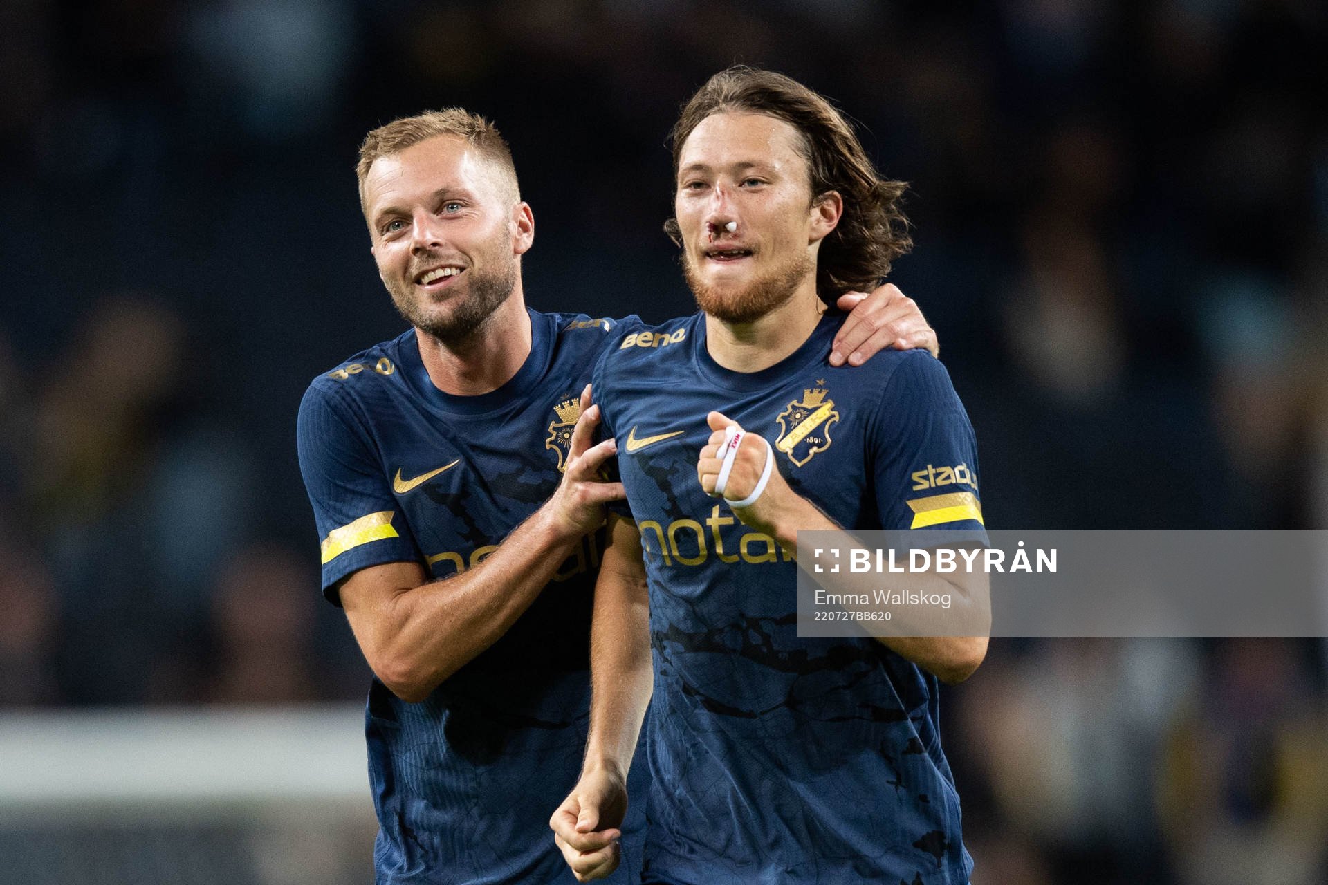 Sebastian Larsson and Axel Björnström of AIK celebrate