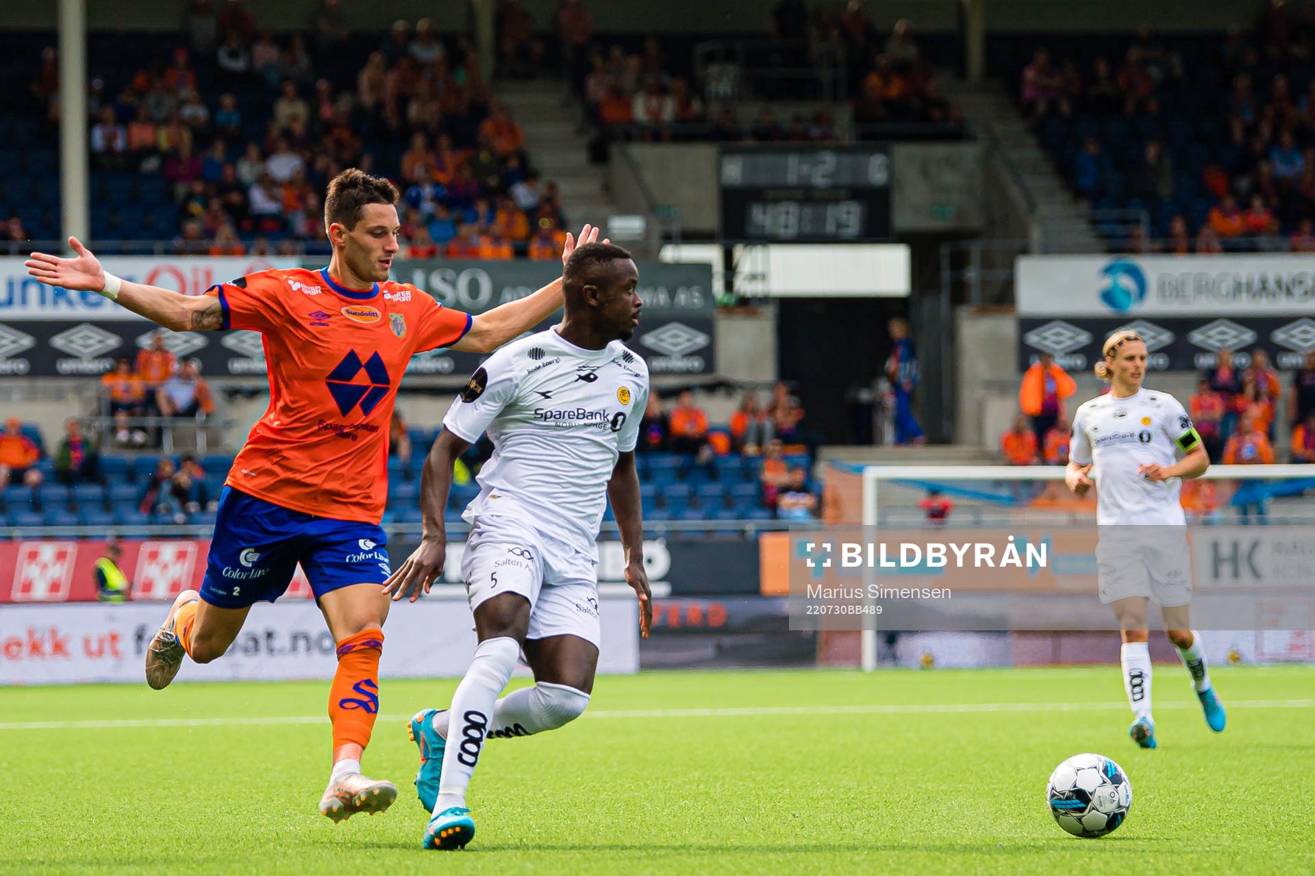 Petar Golubovic of Aalesund and Brice Wembangomo of Bodø/Glimt during the Eliteserien match between Aalesund and Bodø/Glimt on July 30, 2022 in Ålesund.
