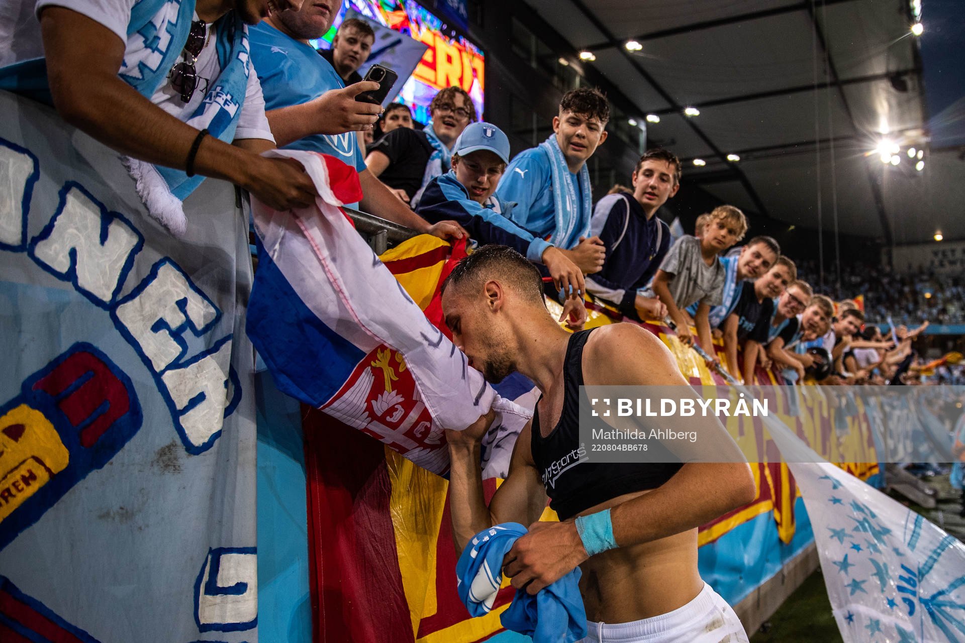 Veljko Birmancevic of Malmö FF kisses a flag