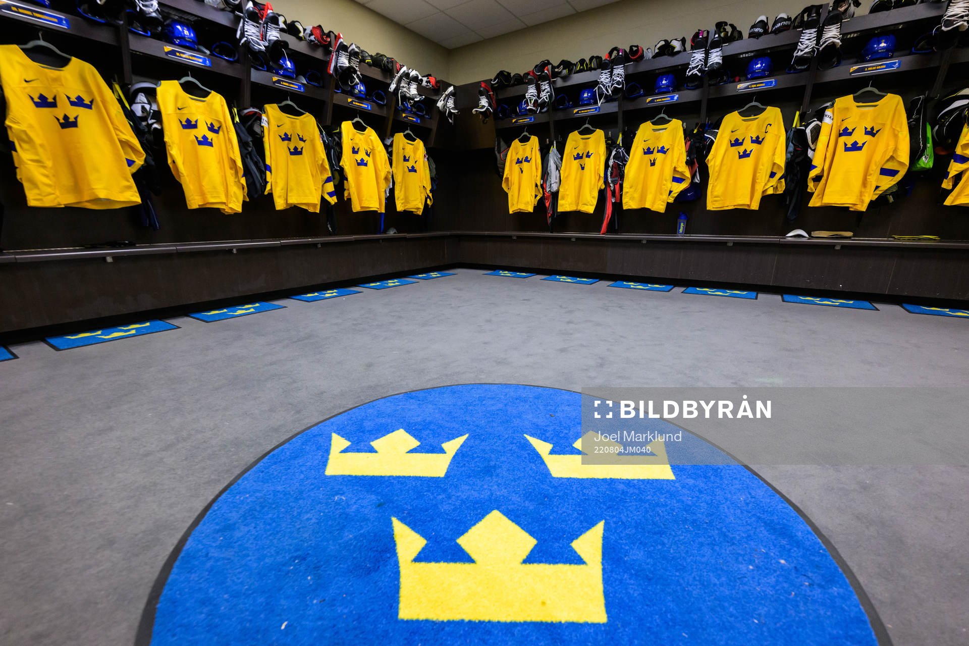 Jerseys of Sweden hanging in the locker room