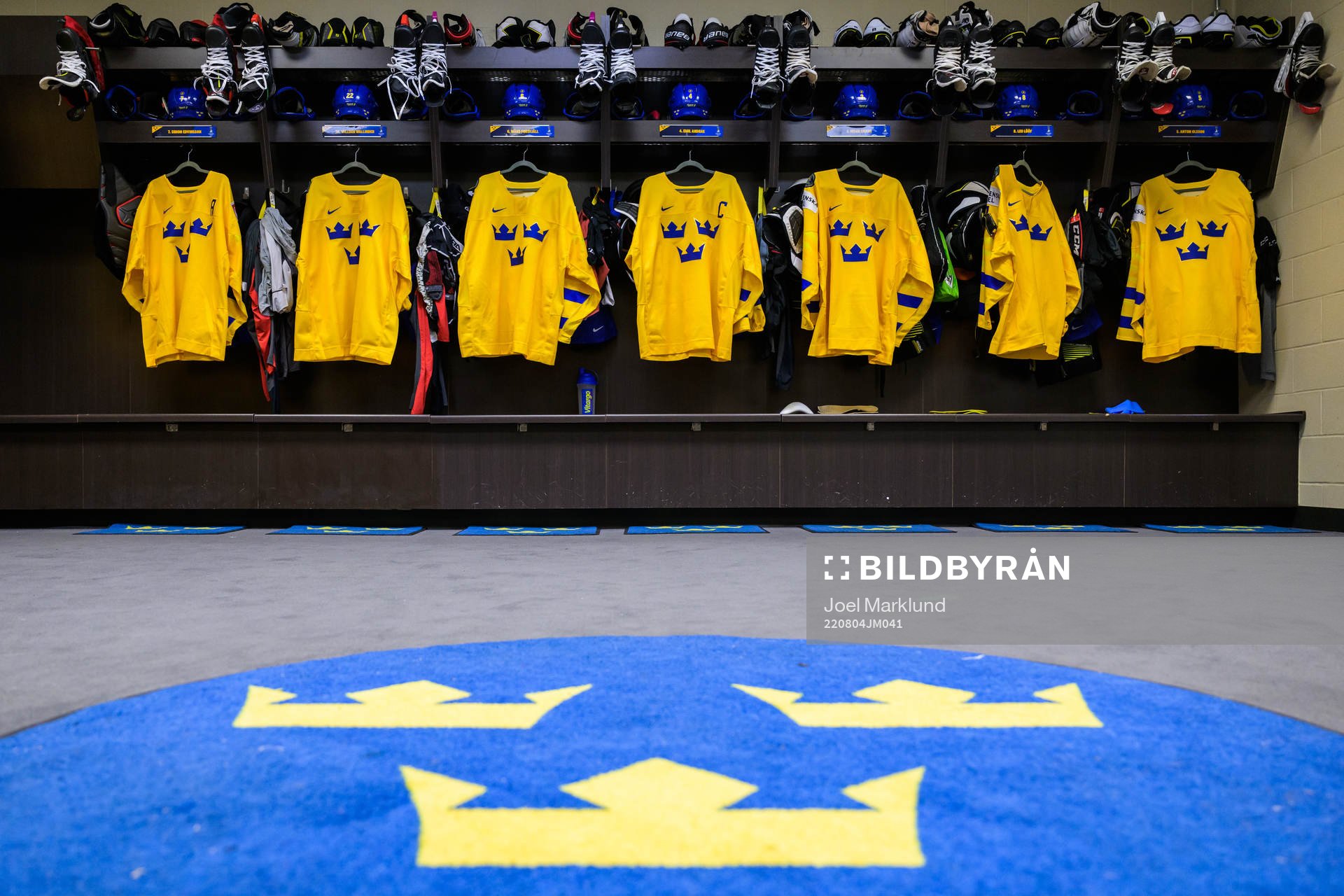 Jerseys of Sweden hanging in the locker room