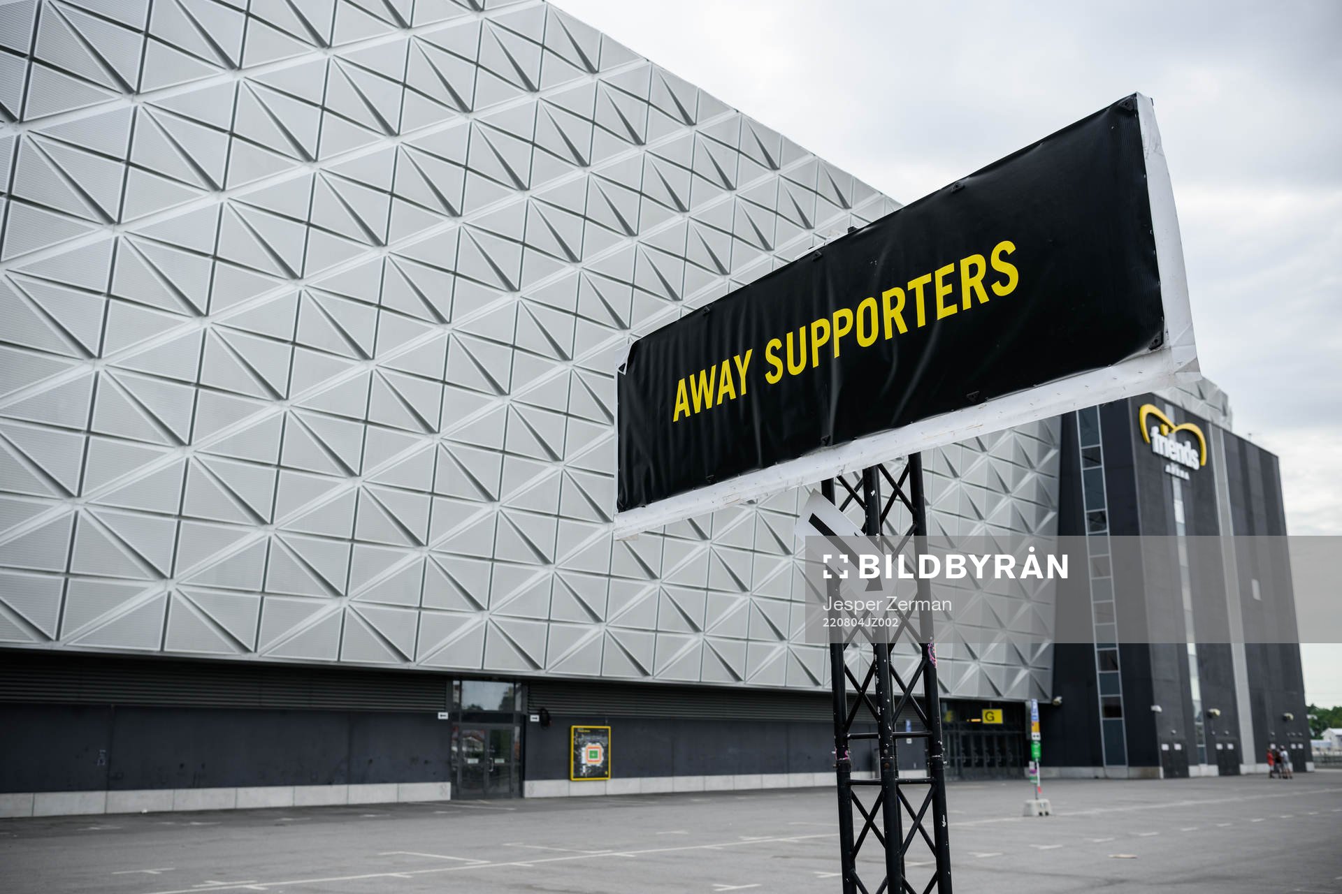 A sign with the text away supporters