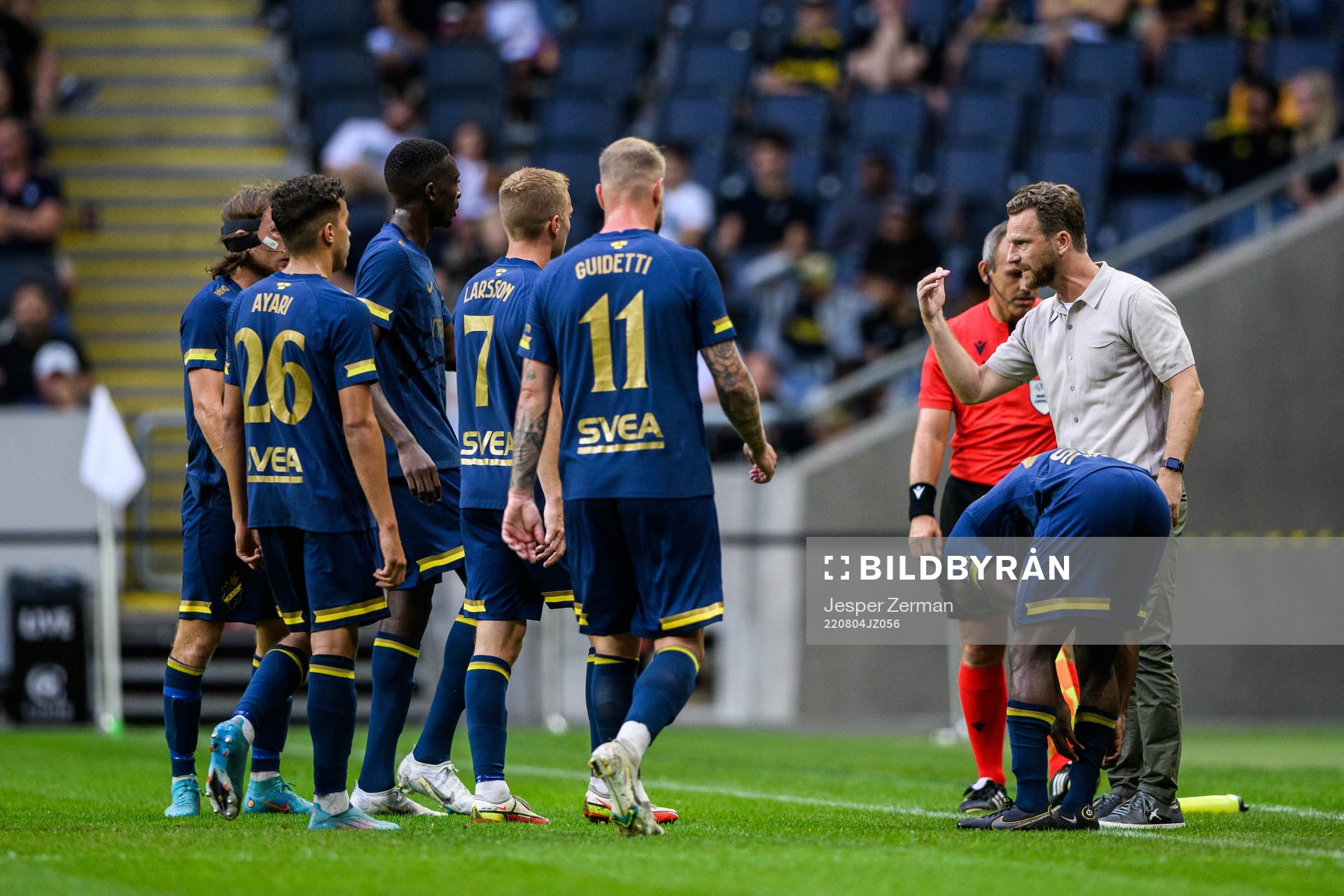 Bartosz Grzelak, head coach of AIK gather his team
