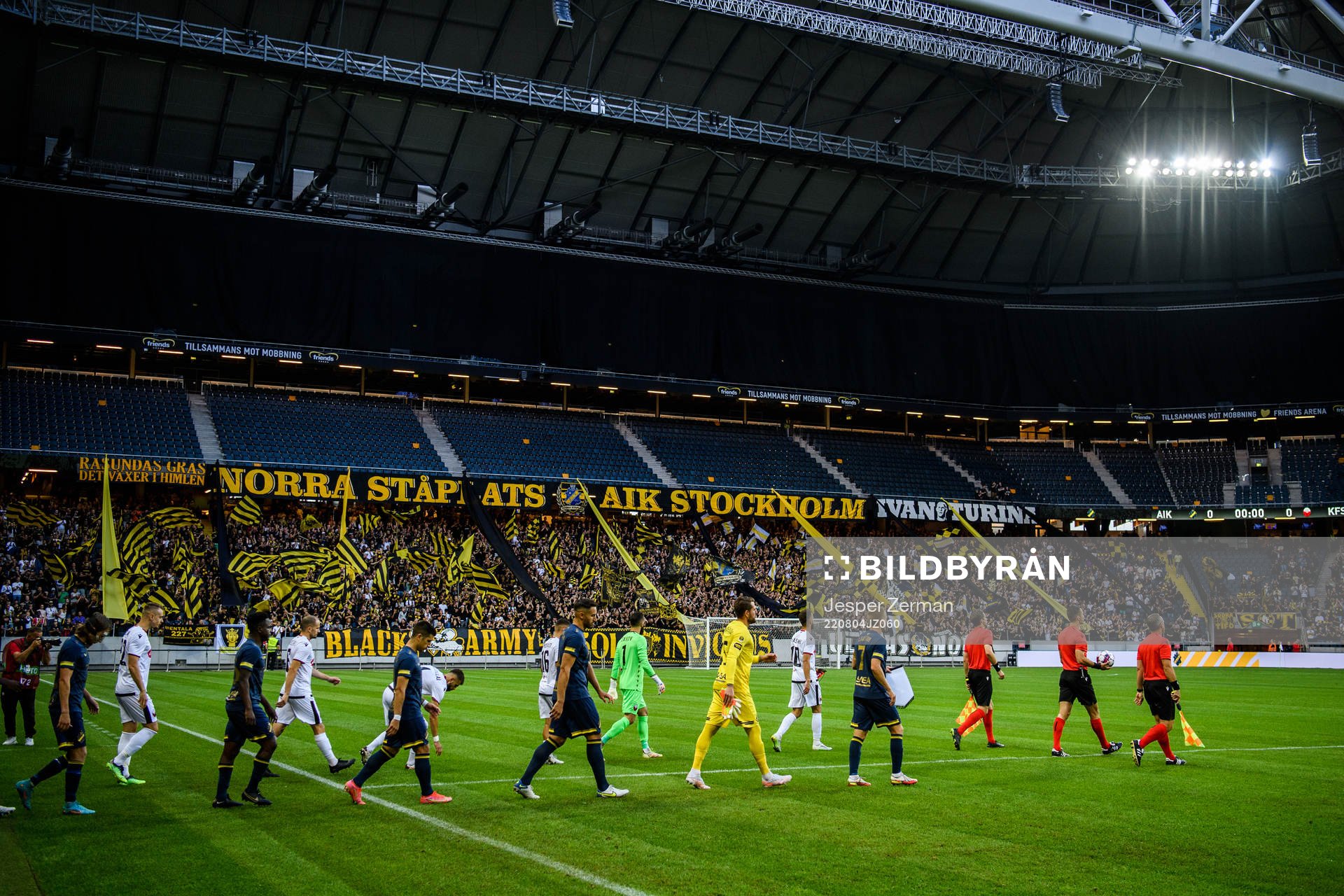 Players of FK Shkendija and of AIK enter the arena