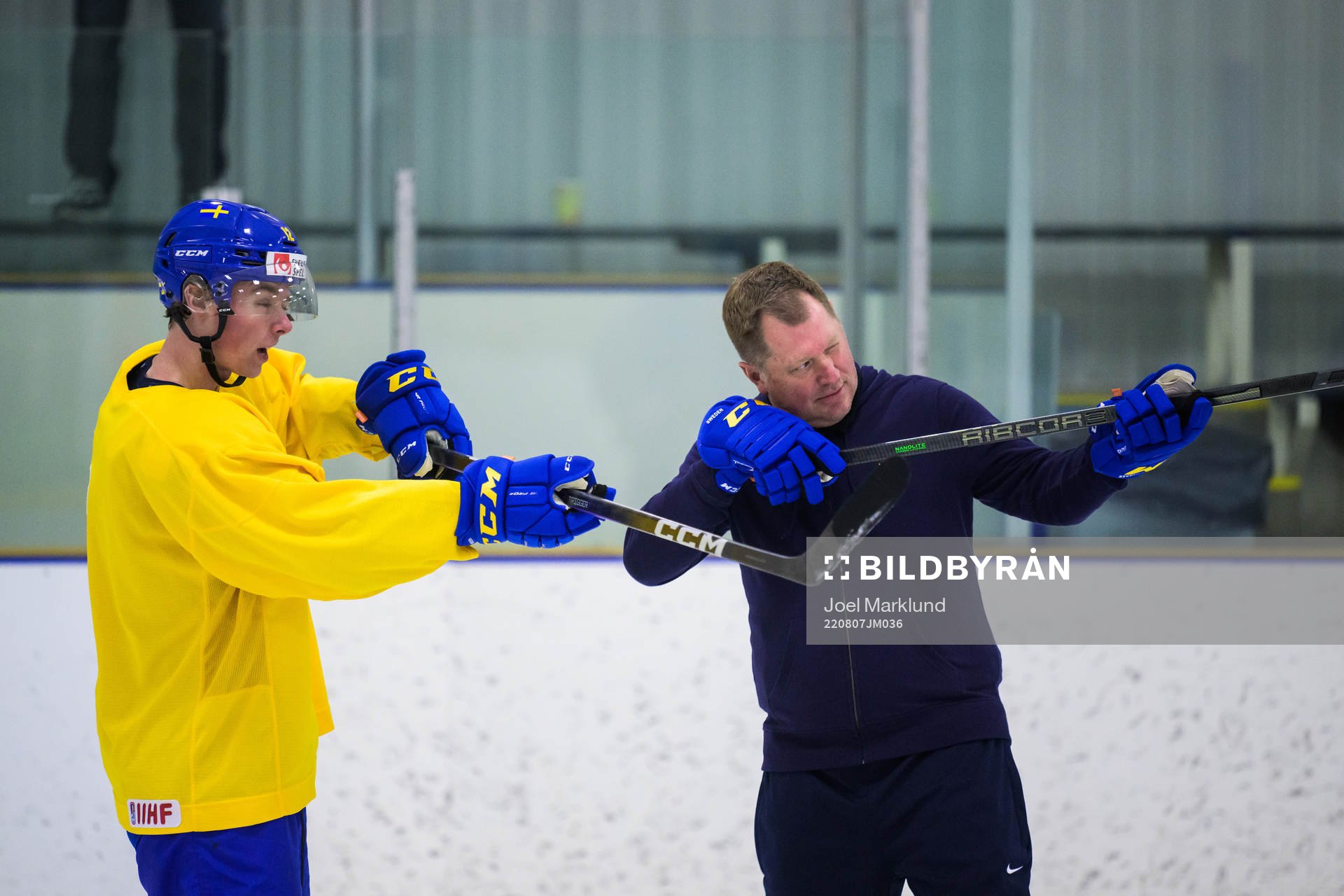 Ludvig Jansson and goaltender coach Peter Andersson of the