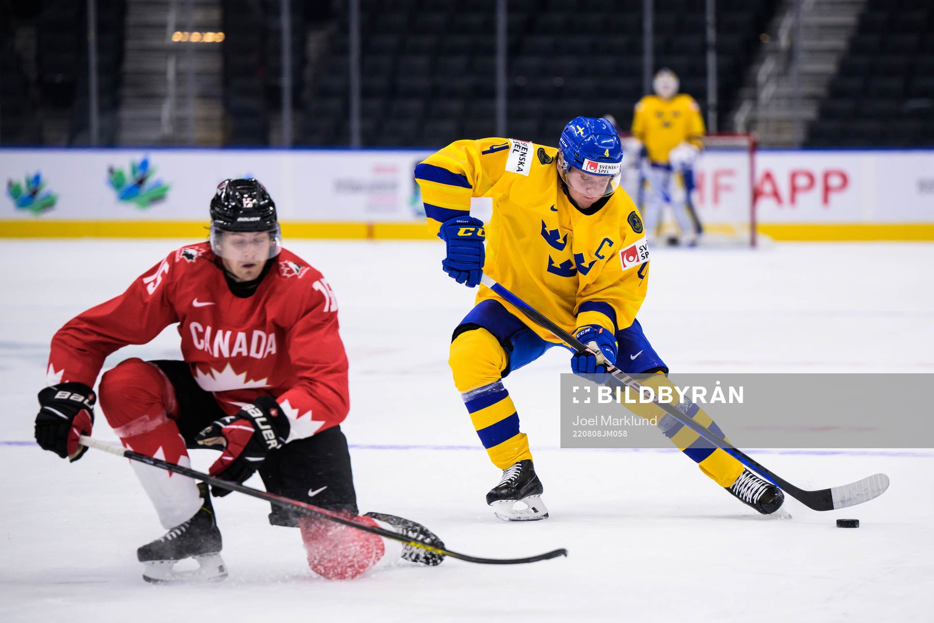 Brennan Othmann of Canada and Emil Andrae of Sweden