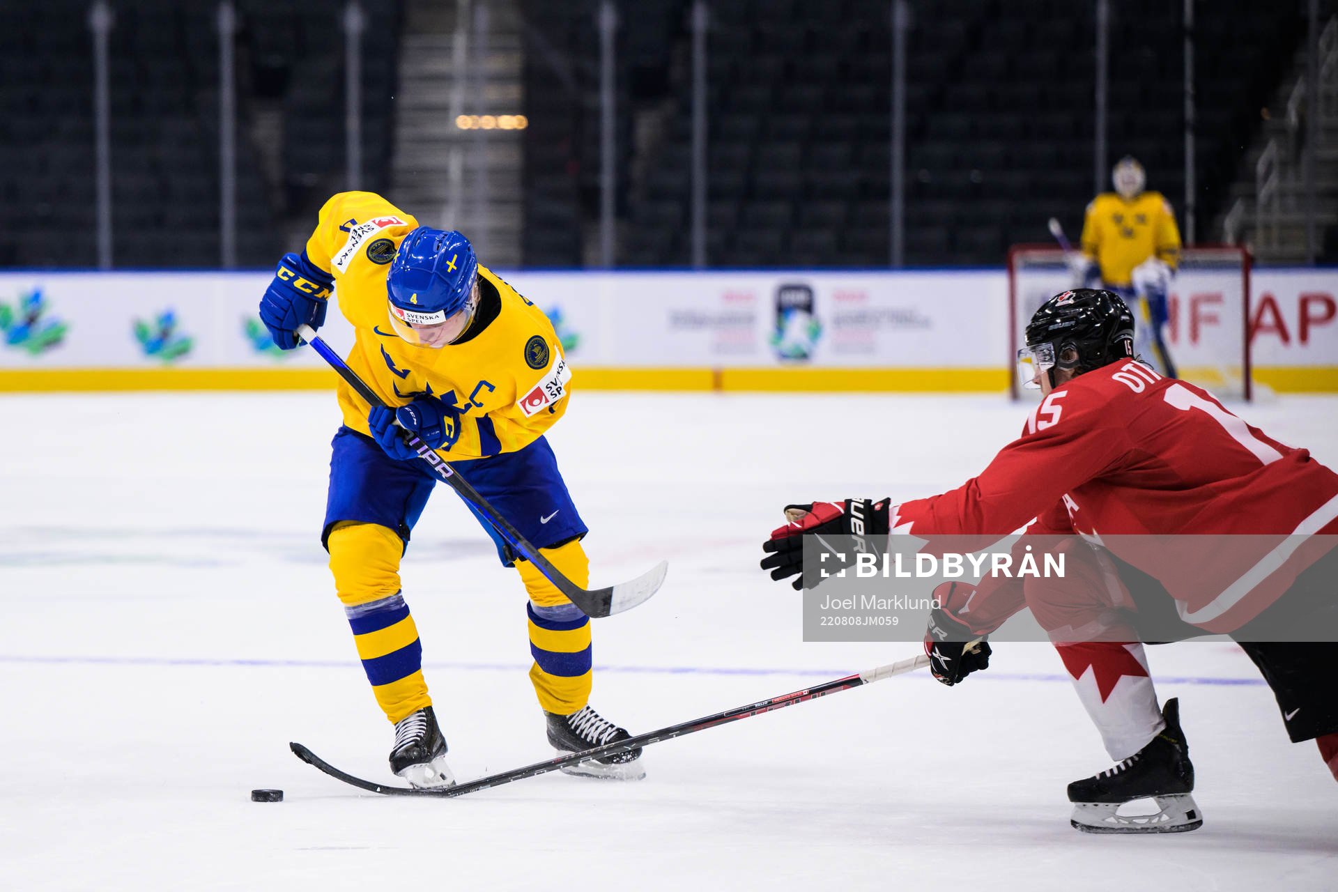 Emil Andrae of Sweden and Brennan Othmann of Canada