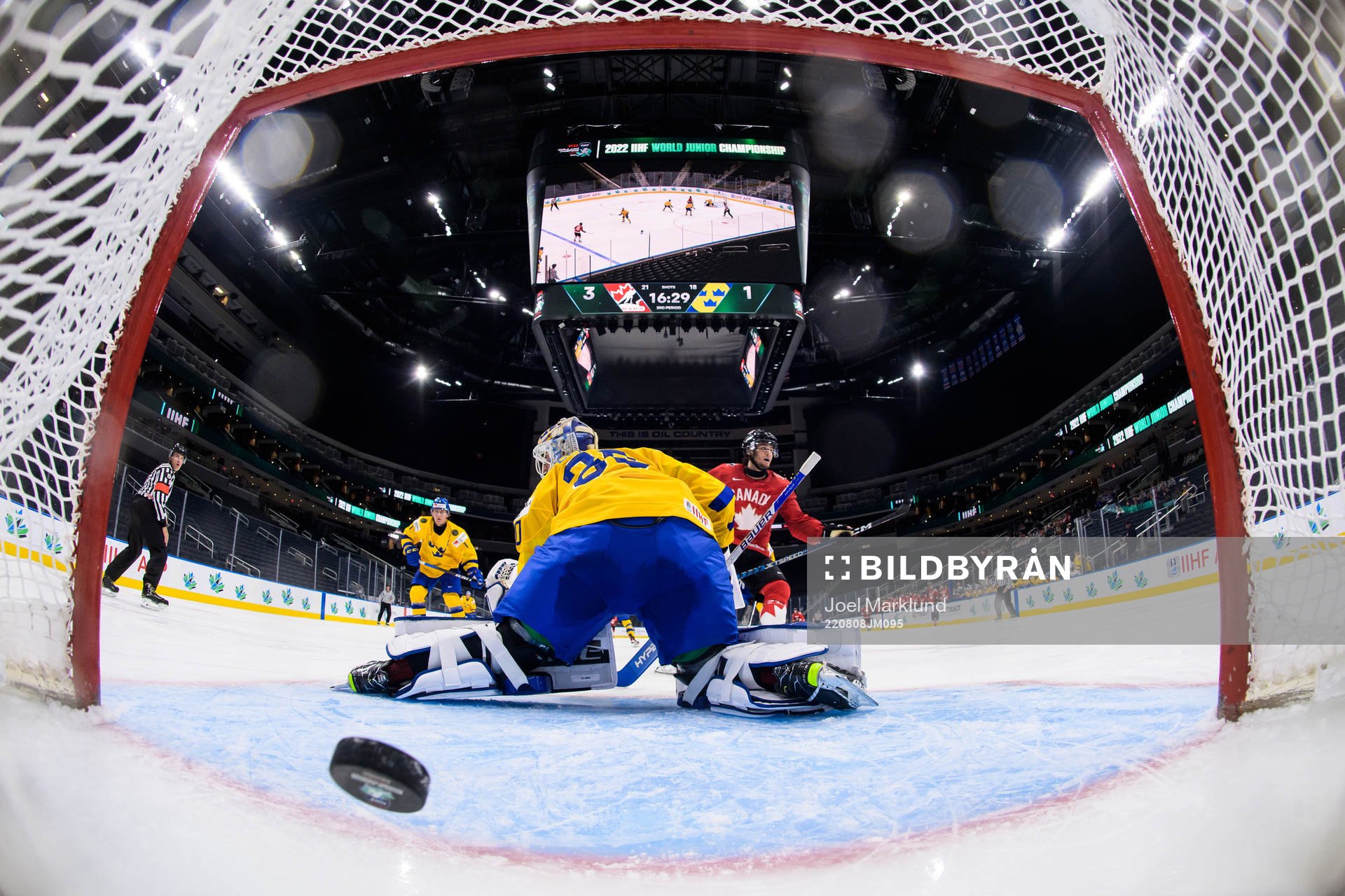 Joshua Roy of Canada celebrates as he scores 4-1 behind