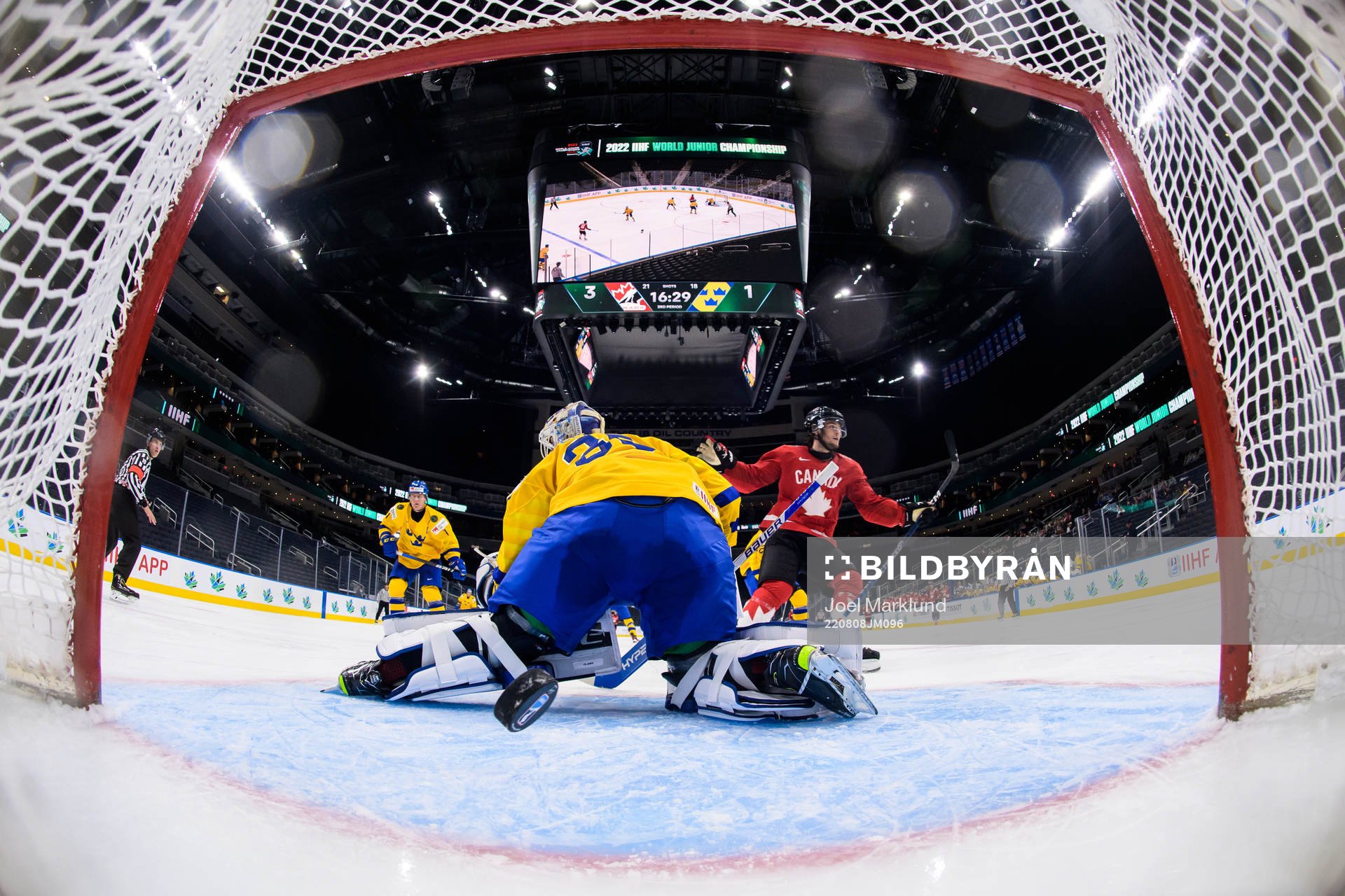 Joshua Roy of Canada celebrates as he scores 4-1 behind