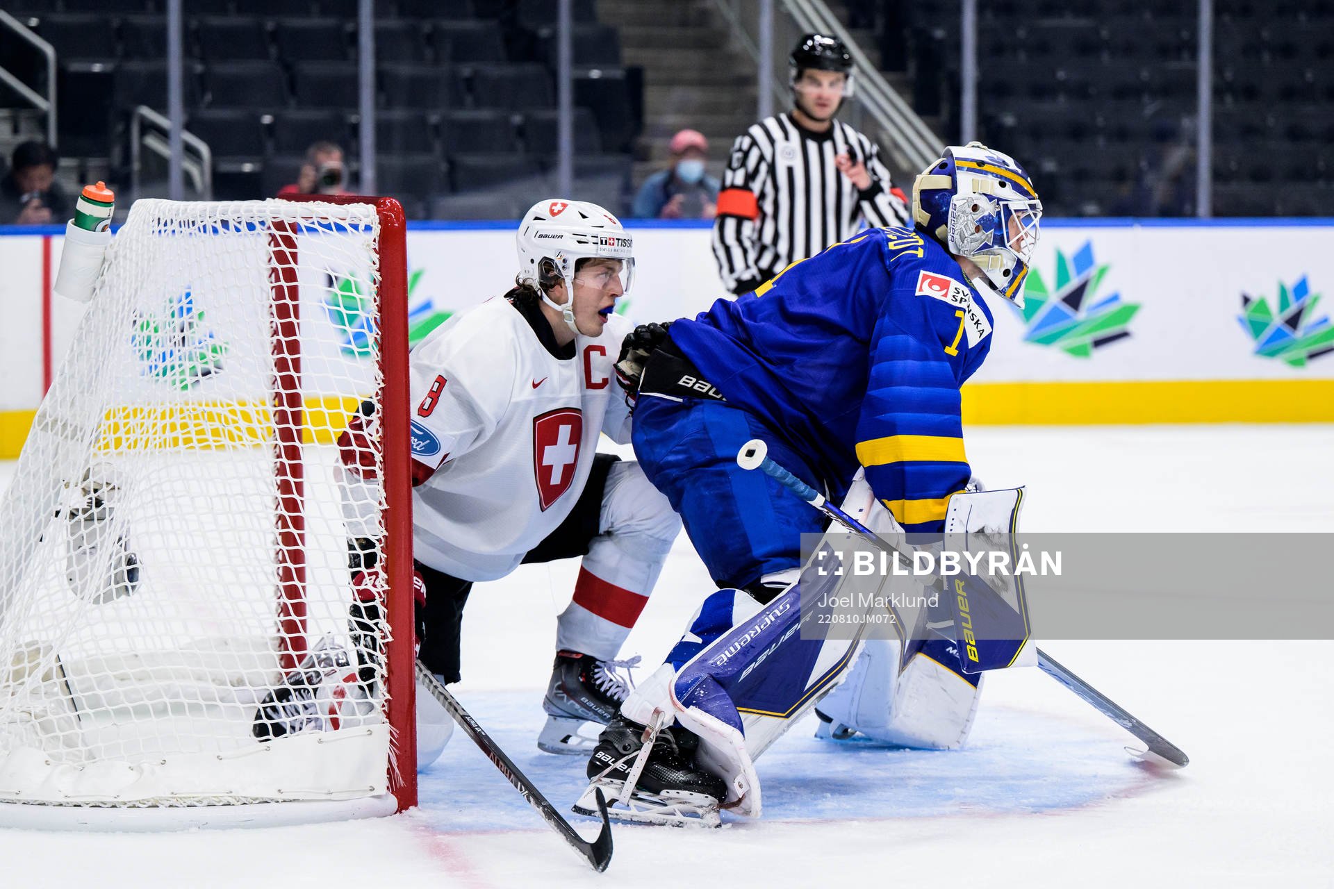 Simon Knak of Switzerland and goaltender Jesper Wallstedt