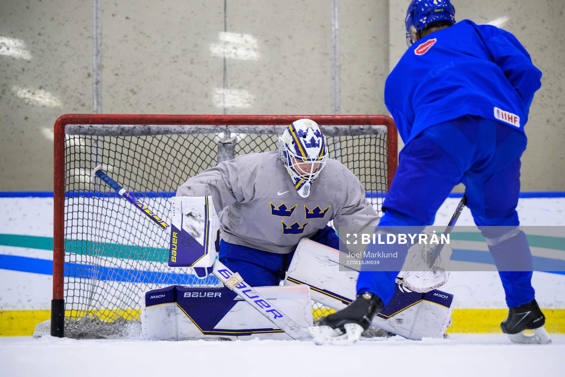 Goaltender Jesper Wallstedt and Emil Andrae of Sweden at a