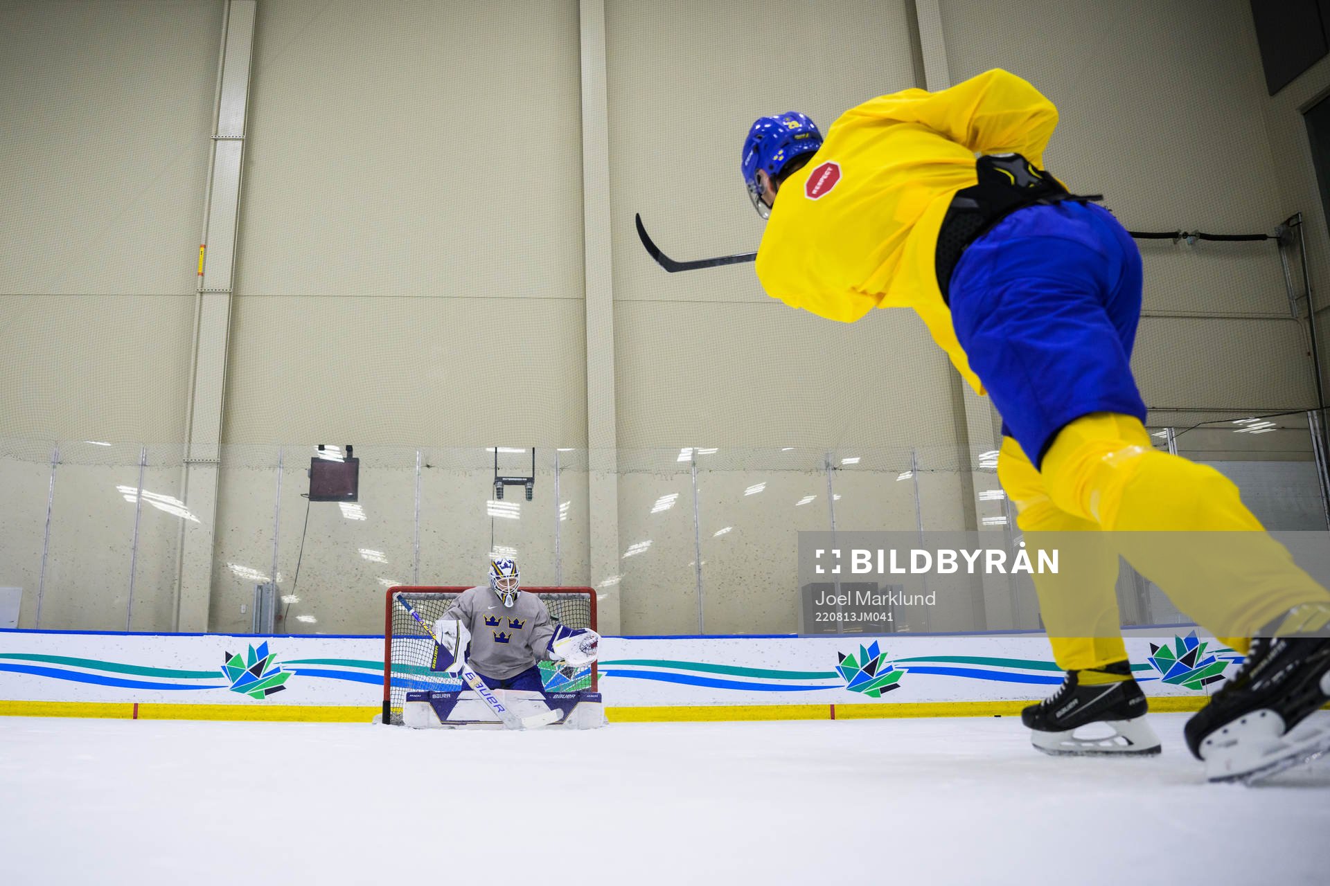 Goaltender Jesper Wallstedt and Daniel Torgersson of Sweden