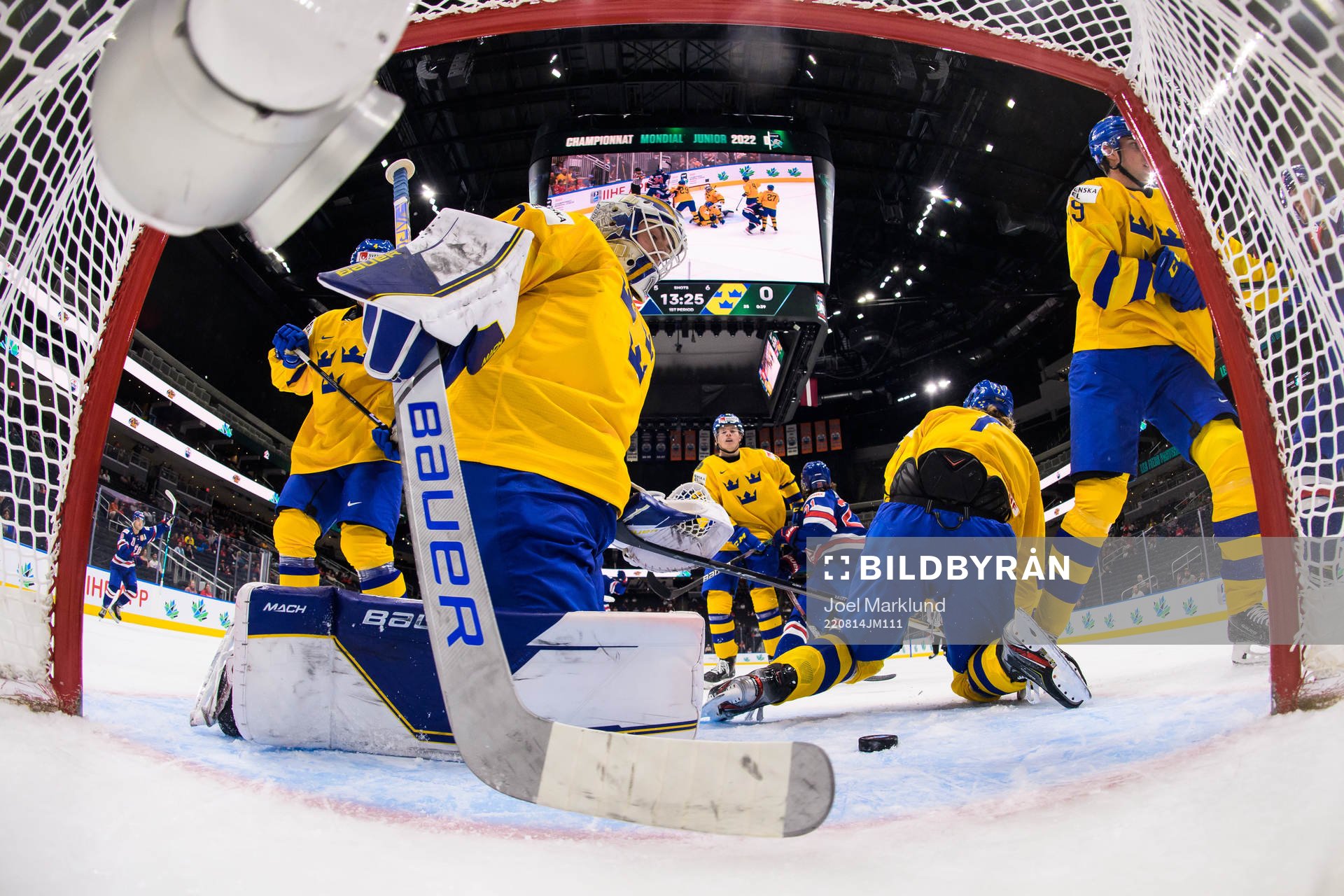 Goaltender Jesper Wallstedt of Sweden looks dejected