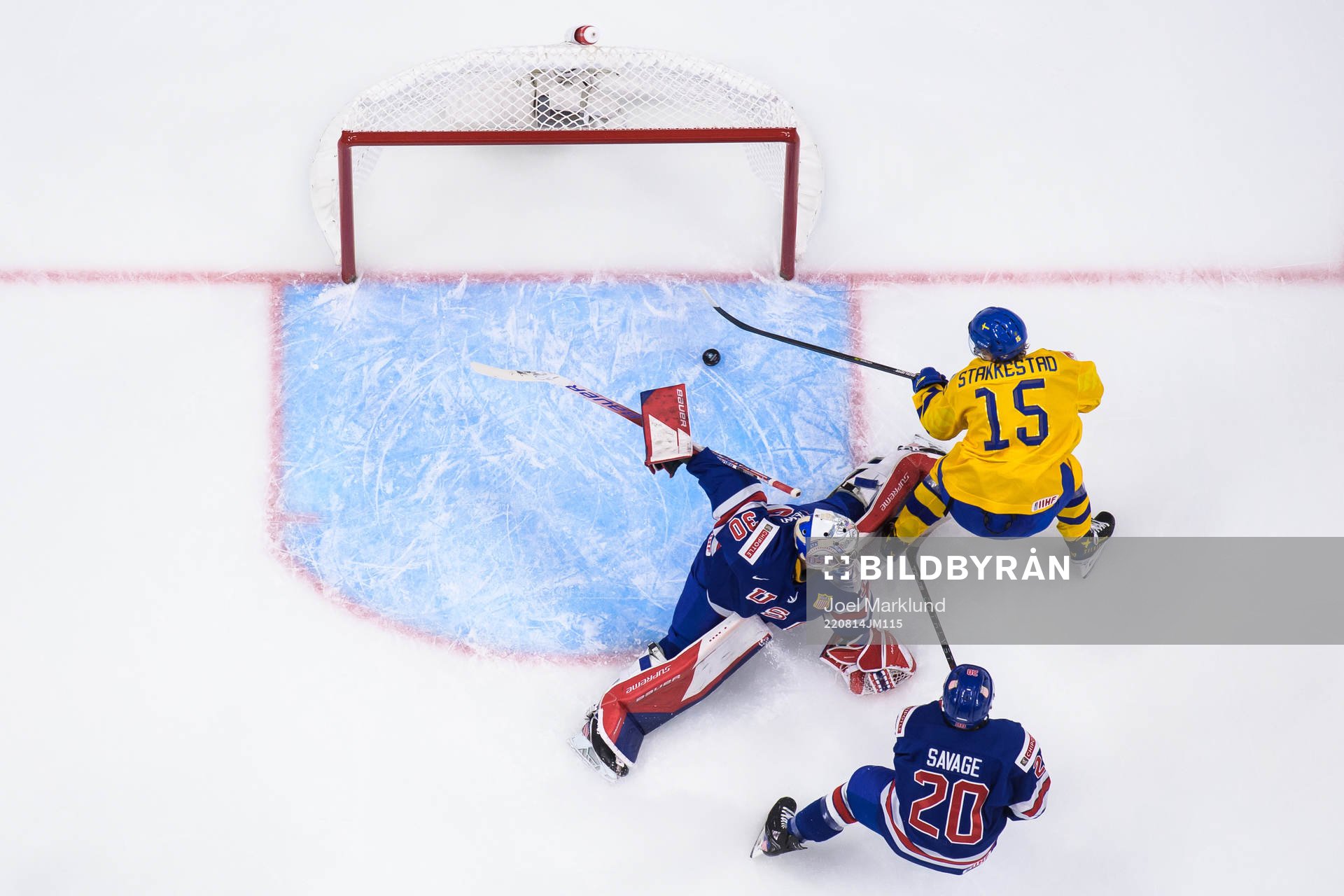 Goaltender Kaidan Mbereko and Red Savage of USA are being