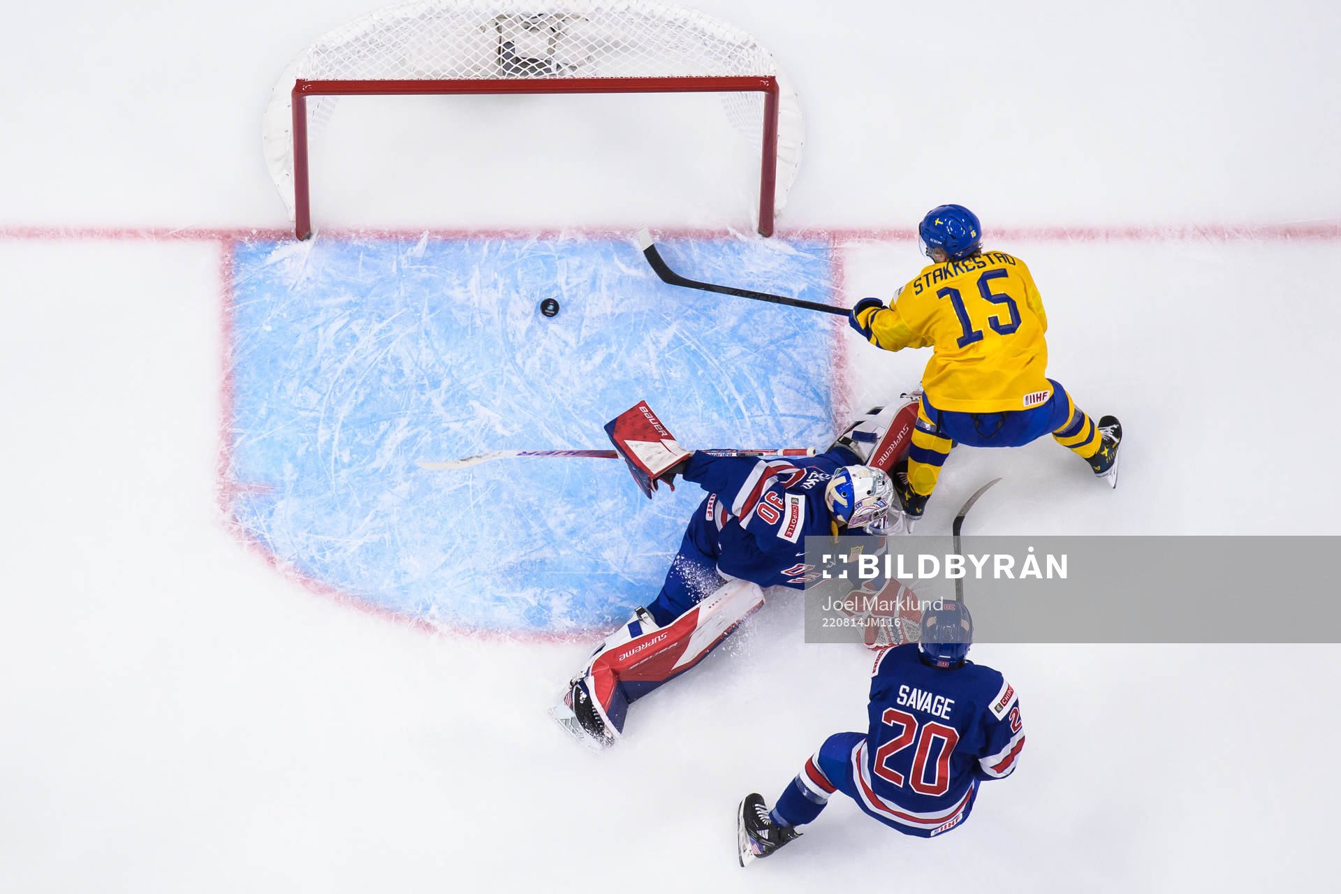 Goaltender Kaidan Mbereko and Red Savage of USA are being