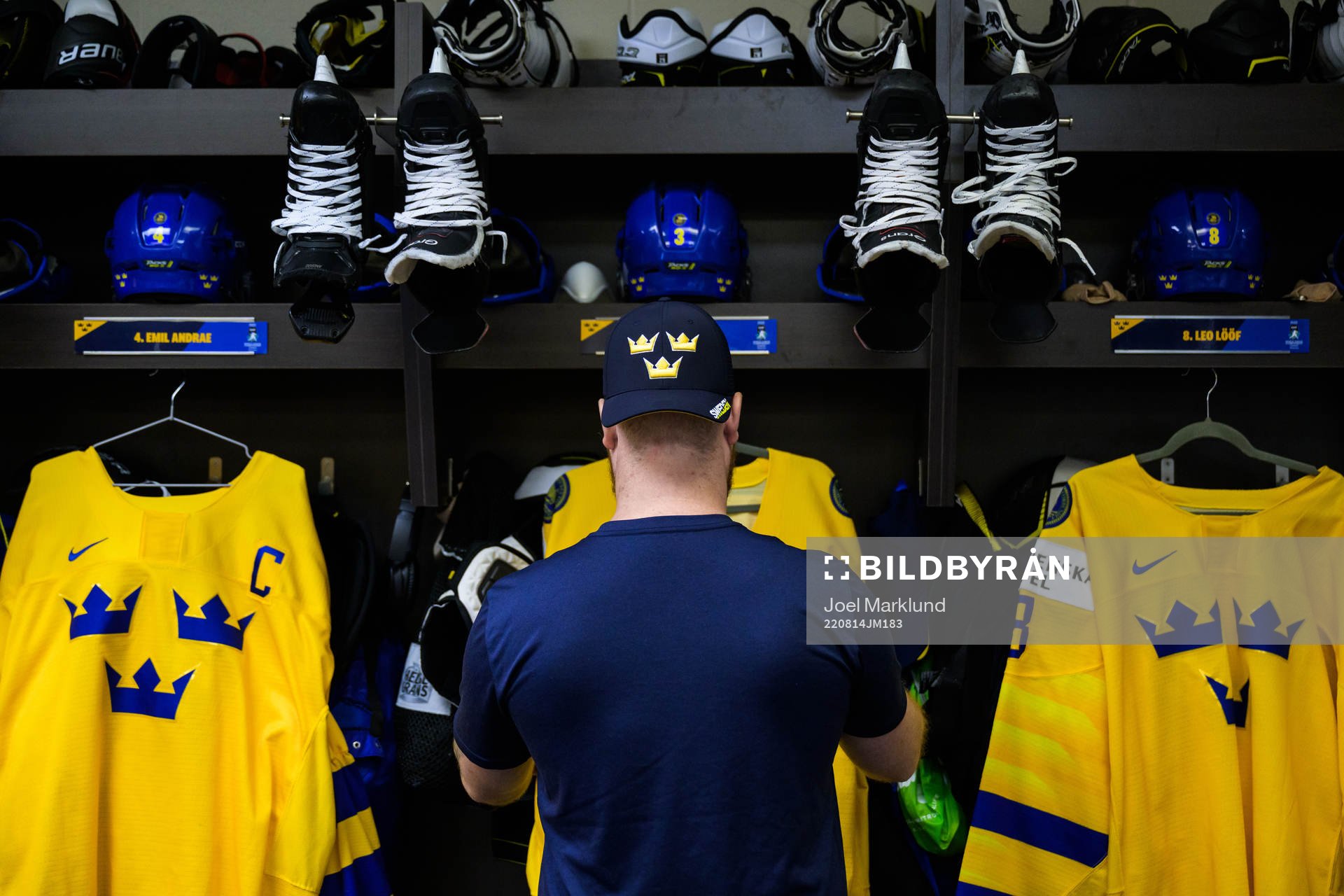 Equipment manager Andy Fagerström of Sweden hangs jerseys